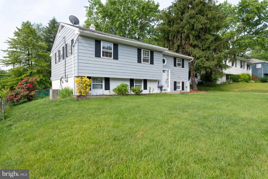 Move right in!  This beautifully renovated home with its open plan has so many wonderful details, and so much space!  Main level has a large living/dining room with refinished hardwood floors and a beautiful decorative fireplace.  Living/Dining is open to the kitchen, which features wood cabinets, granite countertops and upgraded appliances.  Three large bedrooms and a luxury bath complete this floor.  Hardwood floors  have just been refinished and are throughout the main level.  The lower level is huge!  There is a fourth bedroom and full bath, a family room with sliding doors to a patio and a large, flat, fenced rear yard (with a bonus storage building!).  The lower level also boasts an office and laundry, with loads of storage.   This is your dream home!