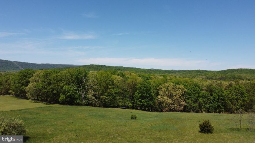 4 acre level, partially wooded building lot with electric at site and an approved perc on file.  Beautiful mountain views all around.  Conveniently located between Fort Ashby and Keyser.  Shopping nearby in Keyser, Cumberland and Lavale.  Convenient to Northrupp Grumman, UPMC, Hampshire and Potomac Valley Hospitals.