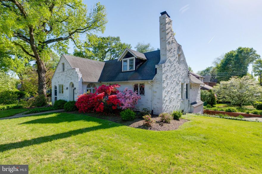 OPEN HOUSE SATURDAY, July 6th from 1- 3 pm. One of a kind Large corner lot on Arlington Ridge Road with a fantastic addition. Lots of light open and airy. Very spacious bedrooms. Hardwood floors through-out, two woodburning fireplaces. Lower level with half bath, walk out and large laundry room leading to a two car garage. Picture perfect stone courtyard off the back of the house.