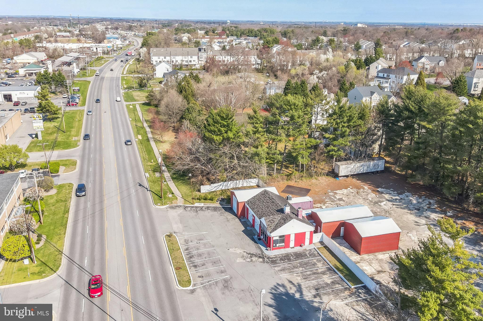 This Amazing Commercial property is a Automotive Mechanics Dream !! Located on Veterans Hwy close to Rt 97 exit and BWI airport with high traffic and visibility for any business. The property has 5 WORK BAYS WITH VEHICLE LIFTS WITH OVERSIZED GARAGE DOOR ACCESS, AIR COMPRESSORS, RECEPTION AREA, OFFICE SPACE, KITCHEN AREA, FULL BATH AND INTERIOR STORAGE AREA. The outdoor parking and storage lot is massive with a privacy fence and locked gate. The property is conditioned with a 3 zoned HVAC systems. It has been approved for nonconforming use C4 Zoning of the current use . This may continue with a like kind property. It has plenty of lot square footage allowing for plenty of parking and a range of commercial uses with proper zoning acquired through AA county. The current owners have added square feet to the building which is now amounts to 3,332 sq ft.