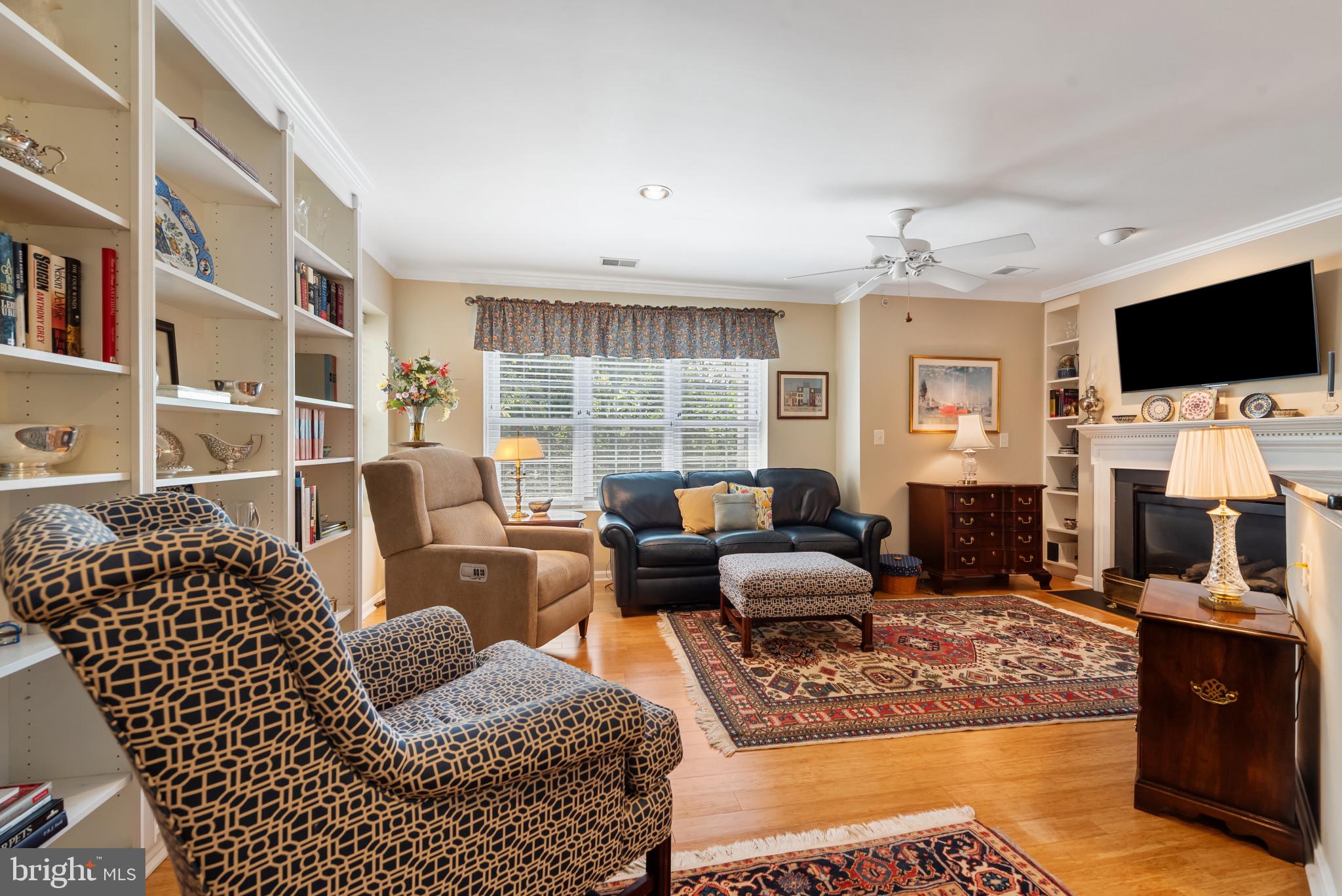 Nestled in the charming community of Timonium, Maryland, the condominium at 12103 Tullamore Court presents an attractive property offering a comfortable and convenient lifestyle. This Condo is in immaculate condition and ready for you.Imagine relaxing in the open living room, where crown molding adds a touch of elegance and built-in shelves offer a place for your favorite books and treasured possessions, while the fireplace provides a warm and inviting glow. The kitchen offers the perfect setting for culinary exploration, with shaker cabinets and granite countertops providing both style and functionality, while the backsplash adds an element of modern design and the kitchen peninsula offers additional space to gather and prepare meals.The Primary bedroom offers a serene retreat, complete with crown molding that enhances the room's sophisticated ambiance and an ensuite bathroom for added privacy and convenience. Second BD serves as a Den/home office w/updated Full BA. Step into the bathroom and enjoy the luxurious tiled walk-in shower.This single-story condominium features a laundry room for ease and convenience, and the balcony offers a private outdoor space to unwind.This condominium offers a harmonious blend of comfort and style, creating an inviting space you'll be proud to call home.