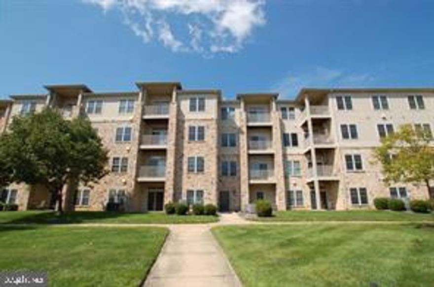 Welcome to 3411 Fountainview Circle in Newark's premiere 55+ active adult community. This lovely 4th floor condominium has been fully refurbished with a host of updates. The 4th level is peaceful and quiet, as there are no units above. Step off the elevator to a luxurious feel, with wide open hallways, featuring your own private storage unit, located just steps away from the condo.  This home has been updated throughout, and meticulously maintained by its current owner. This beautiful property offers an open concept kitchen and living area with 9 foot ceilings. The kitchen has upgraded and new "soft close" cabinetry with tons of space, new countertops, and new luxury vinyl flooring, (2024), stainless-steel double sink with garbage disposal. 2025's kitchen updates include luxury finishes: beautiful NEW tile backsplash, a BRAND NEW  appliance package offering Whirlpool appliances: refrigerator, dishwasher, stove and microwave. In addition, a water filtration system was added to the kitchen, as well as an upgraded Dutch Country Style kitchen faucet, and new ceiling fan (2025). Straight off kitchen you'll find a stacked GE washer/dryer combo in the utility closet, for convenience.  The living room offers a NEW ceiling fan, as well w/ remote, matching the kitchen's fan. Notice the newer carpeting and fresh paint (2024), as you enter the primary bedroom. This bedroom features a walk-in closet, w/ new hooks for organization, a spacious en suite bathroom with walk in (2 seat) shower, new cabinetry, and new luxury vinyl flooring.  The primary bath offers brand new tile, (2025), as well as newly upgraded Mid Century Modern faucets. The second bedroom offers a large double closet and convenient hall bathroom with newly installed herringbone style, tiled  bath, (2025), new flooring and new cabinets, (2024), and updated faucet, (2025). The living/dining area off the kitchen features a sliding door, leading to a tranquil balcony, perfect for fresh air.  The condo fee includes  exterior maintenance and repairs,  landscaping, trash and snow removal, as well as the gorgeous outdoor community pool, during the summer season. This 55+ community is conveniently located near a variety of shopping centers, a multitude of restaurants and the Newark Senior Center. With all of 2025's upgrades, this condo is move in ready!
