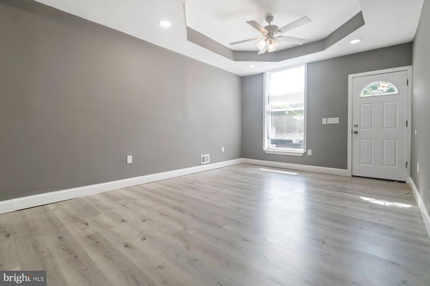 Beautifully remodeled 3BR/2.5BA Townhome located on a quiet street.  Make your way to the front door of your new home and step inside to a home filled with tons of natural light, a newly painted interior, easy care and carpeted floors, and the open floor plan homeowners are seeking.  The main floor boasts a large living room with a custom coffered ceiling, a spacious dining area, a half bath, and a brand new kitchen.  The kitchen features plenty of cabinets, sleek quartz countertops with a beautifully tiled backsplash, and a deep stainless sink under a window. On the second floor are two sizable secondary bedrooms, a large primary bedroom, and a newly remodeled full bath.  The lower level offers tons of opportunities for additional living space, laundry, storage, and a walk-out to the fenced yard. From the kitchen step outside to a yard filled with so many possibilities.   This home is move-in ready with so much to offer new homeowners and is located in close proximity to shopping, restaurants, and commuter routes.