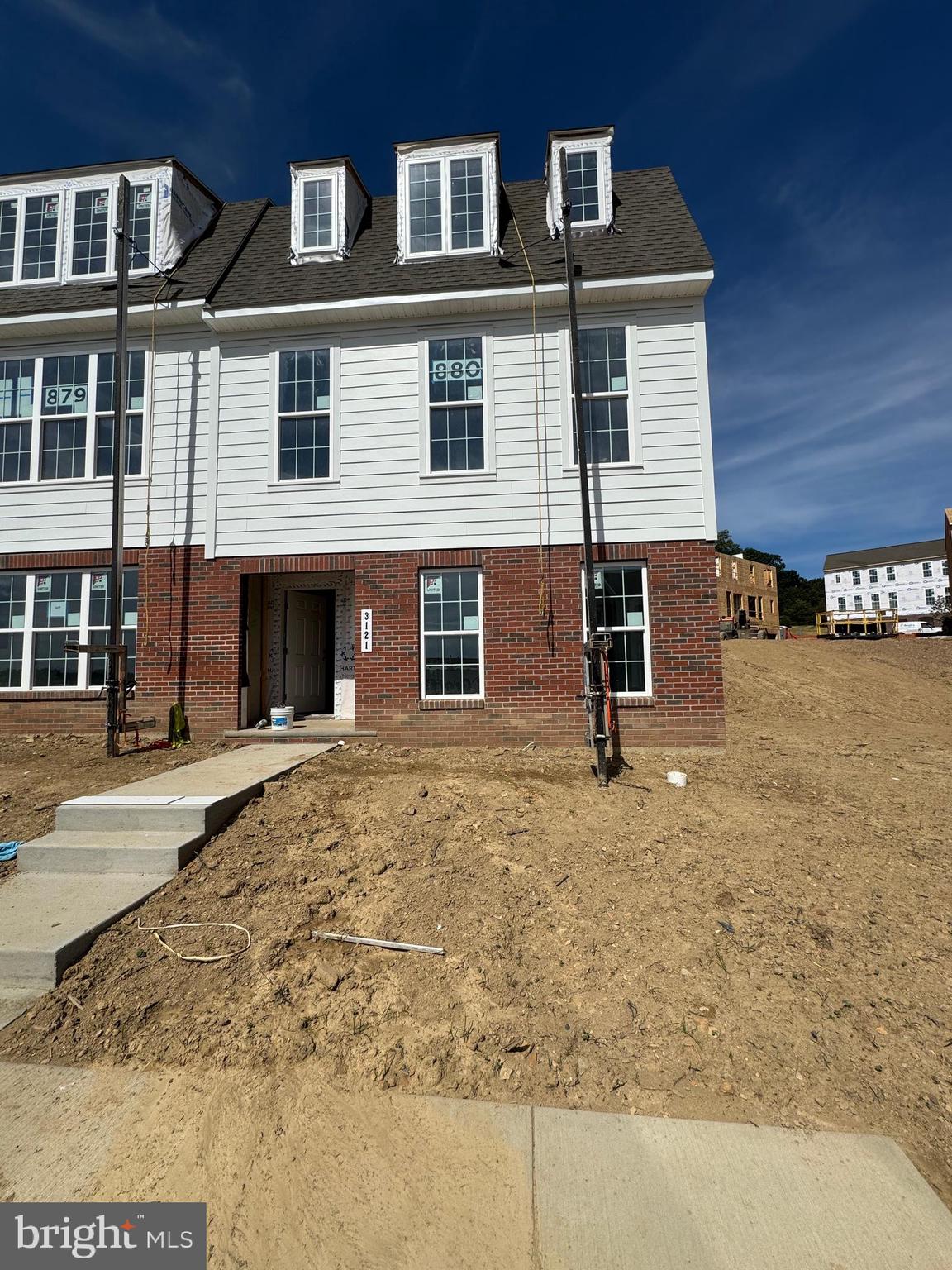 UNDER CONSTRUCTION! Brand new 4 bedroom, 3 bathroom town homes currently being built on Overlook Drive in Arcona. Estimated completion is on or around October 1st. This vibrant community offers unmatched amenities including a fitness center, pool, shops, dining, walking trails, and open common grounds—perfect for an active lifestyle. The home’s thoughtfully designed layout begins on the entry level with a spacious foyer/mudroom and a versatile bonus room with a walk-in closet and full bath—ideal as a 4th bedroom, office, or guest suite. The main level features a two-car garage, a bright and airy great room with elevated views, and an open kitchen with pantry, large island, stainless steel appliances, gas cooking, and a deep farmhouse-style sink. Upstairs, the primary suite includes a walk-in closet and private bath with double vanity and stall shower. Two additional bedrooms, a full hall bath with tub/shower, and a convenient laundry closet complete the third floor. Located just steps from the community pool, this home combines comfort, convenience, and lifestyle in one. Pets will be considered on a case-by-case basis.