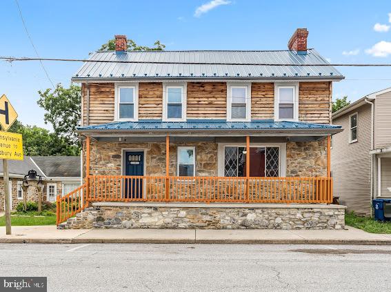 Nestled in Smithsburg, this charming historic stone and cedar home masterfully blends vintage charm with modern amenities, boasting a renovated kitchen and bathroom, metal roof. Captivating beams in the dining room and quaint
fireplace in the living room are perfect for cozy winter evenings, while the outdoor oasis invites warm weather
entertainment with a hot tub, in-ground pool, outdoor kitchen-bar, and screened gazebo.