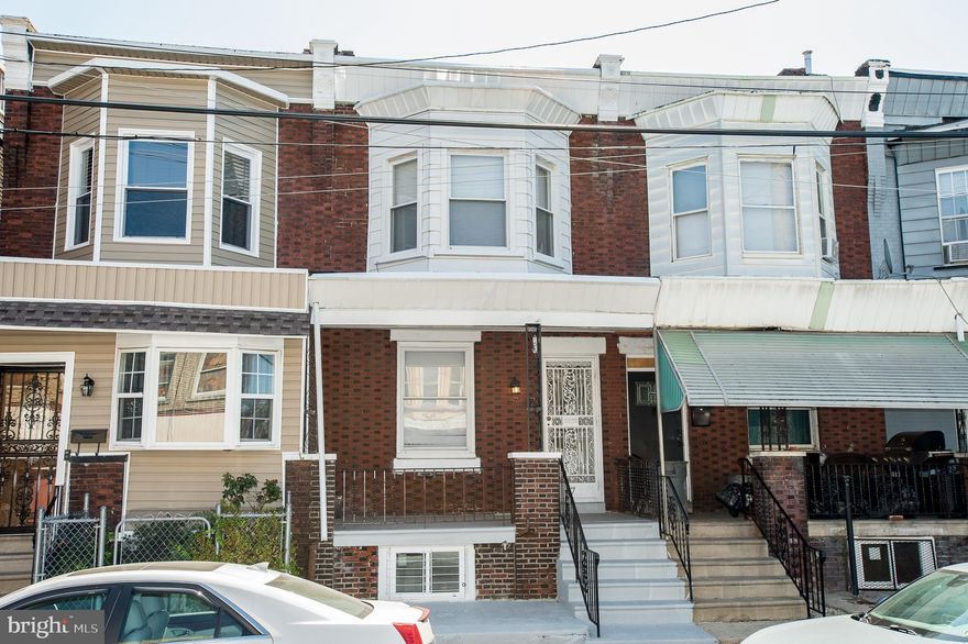Lower Interest Rates! -  make this Beautifully Renovated 4 Bedroom Brick Home in Walnut Hill section of West Philly, steps away from the El Train and Public Transit a Must see.  Everything you could want in your NEW home - First Floor Laundry area and Powder Room, Finished Basement with a 2nd Powder room, 4 Large Bedrooms and Full Bath upstairs. NEW HVAC and Central Air, plus a Charming Front Porch and Private, Fenced in Patio make for Dream Living!  Enter Front Door from Porch into Open floorplan. Living and Dining Areas Feature Engineered Wood Flooring, Recessed Lighting with Convenient Powder Room and Laundry area. Strait past your Living Dining area is the New Custom Kitchen Featuring Quartz Countertops, Tile Backsplash,  all New Stainless Steel appliances, Dishwasher, Built in Microwave, Custom Cabinets and Plenty of Shelving. Step out the Kitchen to the Back, Fenced in Patio, Great for Grilling, Entertaining or a perfect spot for Pets.  The Engineered Wood Flooring and Recessed Lighting Continues upstairs, where you'll enjoy 4 well sized Bedrooms plus Custom hall Bath featuring Ceramic Tile Flooring and Shower Surround plus all new fixtures.  Your Lower Level Basement is also Fully Finished with high Ceilings, Ceramic Tile Flooring and another Half Bathroom - making a perfect space for a Playroom, Workout space or Entertainment area. Located steps from Public Transit, Minutes from Center City, University of Pennsylvania and Cobbs Creek Park make this Home a must see!