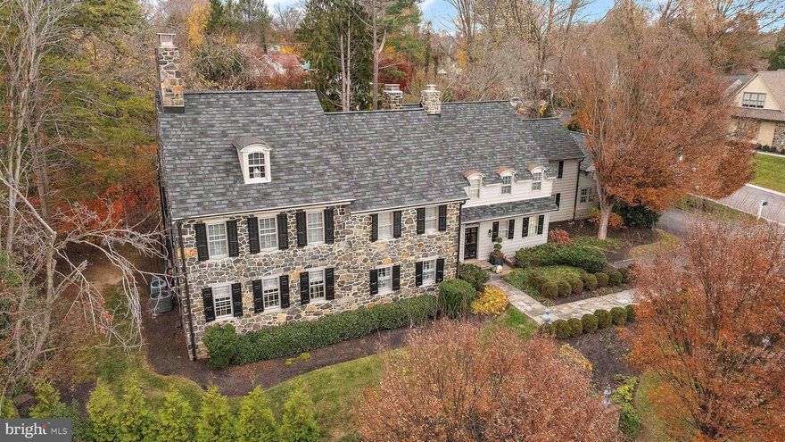 Exceptional opportunity to own a beautifully renovated home with classic historic elegance within walking distance to the restaurants and shops of Greenville proper. The original construction of this stone home dates back to 1802 and the story passed down through the years is it was built for the first sheriff of either Wilmington or New Castle County. Modernization through the years has not taken away from the hallmark of construction this time period is known for.  The renovation project will be completed in mid-January when Dewson construction replaces all existing original windows with new Pella models. Gorgeous random with hardwood floors that were recently refinished flow through the home width pegged floors on most of the main level, poplar on the 2nd floor, and heart of pine on the 3rd floor.  Beautiful doors adorn built-ins and elegant millwork highlights many of the spaces.  Home features 6 fireplaces with a mix of wood and natural gas. Abundant living space for entertaining and work from home options. The kitchen has been fully renovated with abundant cabinetry, quartz counters, and high-end appliances like 6 burner Wolf stove, SubZero refrigerator, and 2 dishwashers. During renovations a wall was removed to open the space up into a family and added a Butler’s pantry with fully equipped wet bar. Upstairs the primary owner's suite is sure to please and includes large bedroom with fireplace, walk-in closet, and spacious master bath that has been fully reimagined to include vaulted ceilings, dual vanity and a shower with skylight bringing the outdoors in. Three additional bedrooms each with a dedicated full bath and laundry room complete the second floor. The third floor is reached by two different staircases with storage and cedar closet with sink closest to primary bedroom and an additional bedroom with fireplace and full bath on opposite side of home. Enjoy the beautifully hardscaped and landscaped half acre from the screened in porch or patio. Ample parking in the front courtyard or detached two car garage.