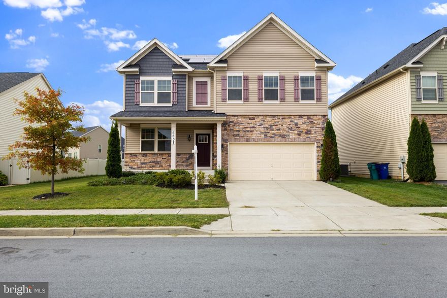 Price Adjustment - Stunning and rarely available 6 bedroom, 4 full bath home in the sought after Manors at Ballenger Creek.  Excellent Location! Enter the main level to an open foyer with gorgeous hardwood flooring throughout the main and upper levels.  A spacious den to your left and large open kitchen/family/dining room with ss appliances, huge center island, large pantry, gas cooking,  bedroom and full bath. The two car garage has extra storage space that opens to the main level. The upper level boasts a spacious open family room space surrounded by four spacious bedrooms, a full bathroom in the hall, and a laundry room. The primary suite has a gorgeous tray ceiling & full bathroom with a separate shower stall, separate bathtub,  & double sink vanity. Walk through the primary bathroom to a large walk in closet.  The lower level is fully finished with lots of sunlight and a walkout to the large rear yard. In addition, it has  a sixth bedroom , extra bonus room, and a full bathroom.  Close to shopping & commuter routes.