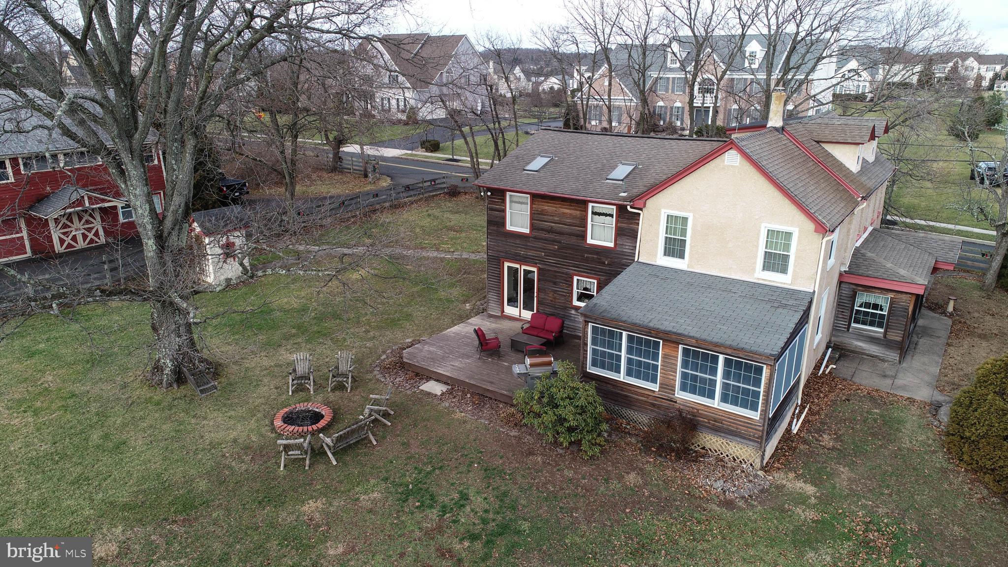 Beautiful Bucks County Restored Stone Farmhouse with tons of charm and coziness with modern updates. The property is tree lined and features a large barn and addition where there are 5 stall tack rooms ready for you to bring your horses. Hilltown Township will allow up to 3 horses (grandfathered in) With a few touches the the 190 x 92 riding ring (with halogen lighting) can be restored to use and your horses will love you!!! The home features a large eat-in kitchen with a gorgeous view of the large yard and sunsets. Wood floors throughout the home with plenty of space and ample room for everyone. Use the dining room as it is or use as a family room. You'll find yourself in the sunroom every morning sipping on coffee and wanting to skip work because its so peaceful. The barn needs some work and can be restored or redone. There's an office in the barn and a place to park your vehicle. Newer roof and well-maintained heating system. Public utilities are available for hook-up. Schedule your showing today!