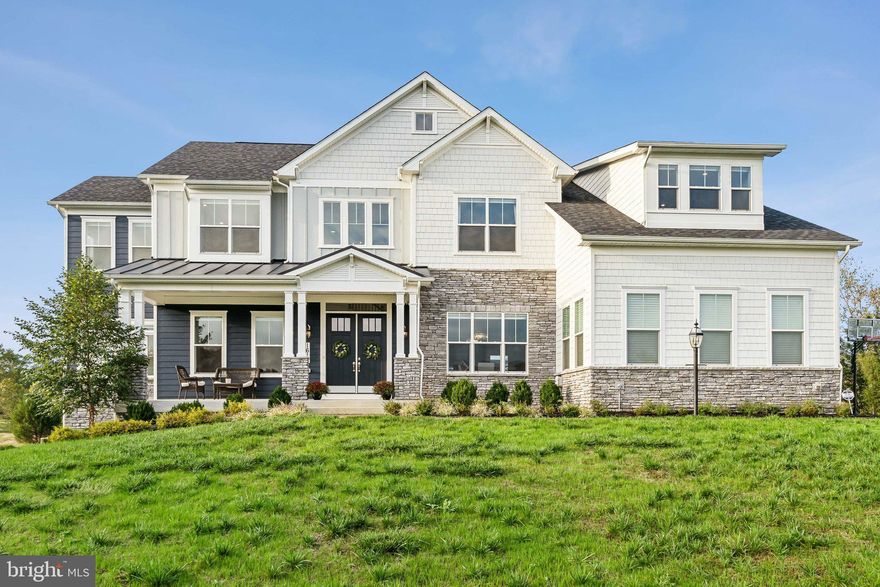 Nestled on 2 lush acres backing up to the scenic Renditions Golf Course, this spectacular 5-bedroom, 5.5-bath Craftsman home in Davidsonville offers a blend of luxury and natural beauty.  Located in a quiet cul-de-sac within an exclusive 24-home community, the property feels both open and private, offering the best of both worlds. Built in 2020, this home spanning over 6,500 sq ft boasts a grand two-story foyer, soaring 10-foot ceilings, hardwood floors, and high-end finishes throughout.  The heart of the home is the great room, where a sun-drenched family room flows seamlessly into the gourmet kitchen and breakfast nook.  The family room boasts coffered ceilings and a fireplace with floor to ceiling stone work.  The kitchen is an entertainer’s dream, with an oversized breakfast island, top-of-the-line stainless steel appliances including two wall ovens and abundant cabinetry and a convenient built-in desk.  Cooking and dining are enhanced by panoramic views from oversized windows overlooking the golf course - perfect for soaking in the breathtaking sunsets year-round.  The separate formal dining room offers an intimate space for entertaining fitting a table for 8+.  A sunroom, office/den and half bath round out the main level. 

Upstairs, the luxurious primary suite impresses with a serene sitting area, walk-in closet and a spa-like en-suite bath with a soaking tub, step-in shower and two water closets.  The suite also boasts stunning views of the golf course and the verdant forest along the Patuxent River.  Primary suite also has a wet bar rough-in- perfect for future coffee bar.  A connected room off the primary bedroom closet offers flexibility as either a nursery, extended closet or another office.  Each of the four spacious bedrooms offers its own en-suite bath. The laundry room is conveniently located on the bedroom levels adding to the home's effortless functionality.  

Downstairs, the finished lower level is ideal for entertaining, featuring a state-of-the-art movie room wired for surround sound and spacious family/rec room. One additional bedroom, full bath and bonus room.  The attached three-car garage provides ample storage space and easy access to the home, ensuring both convenience and security.  Outside, the expansive lot offers endless possibilities, whether you envision a swimming pool, basketball court, or an outdoor gathering space for family and friends.

Perfectly situated between Washington, D.C. and Baltimore, and just 15 minutes from Annapolis, Bowie, and Crofton, this exceptional home combines sophisticated living with unbeatable convenience.