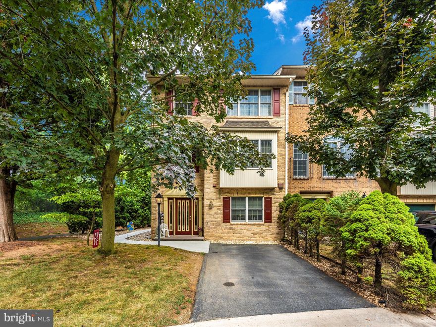 UNIQUE CUSTOM BUILT 2300 SF BRICK END UNIT TOWN HOME LOCATED ON THE LARGEST LOT IN THE NORTH GATE COMMUNITY – Built by developer/builder David Rider for his personal use, this spectacular home is filled with amazing custom features and surprising details. 

Main Level features include a large entry foyer with custom tile flooring an open stairway to the first upper level with foyer overlook. As you continue inward the foyer opens to the large family and dining area with hardwood flooring, a large custom-built raised hearth brick gas fireplace and a beautiful wood mantle. From the family room one can access the patio and the rear yard with a six foot privacy fence with two access and entry gates leading to the community gas-lit walking path. The kitchen features a large open pass through to family room dining area, custom tile floor, custom built-in cherry wood cabinets, plenty of counter space and it own large informal dining area. The entire kitchen is illuminated by a wall-to-wall lighting system. Additionally, there is a wall mounted communication and entertainment control panel with speakers in every room of the house.

The first upper level features an open floor plan with an over-sized carpeted recreation area, two bedrooms one with custom built-in walnut book shelves and each with access to the upper-level deck, as well there is a custom designed full bathroom and a laundry closet.

As you enter the top level which is entirely dedicated to a very private primary suite, you walk into a middle room dividing the primary suite and primary bathroom. This area features a wet bar with refrigerator, sink and cherry cabinetry. Perfect for the late-night snack or beverage. The primary bedroom with vaulted ceiling and sky lights features an expansive sleeping area with a full wall of custom built cherry cabinetry designed for books, collectables and storage. The room also features a raised 3-sided gas fireplace for the cold winter nights. The primary bathroom features a large seated dressing station with a full functioning sink and plenty of cabinetry for storage of personal item. As you round the corner on the left is a glass double shower area and on the right is a large whirlpool soaking bathtub. At the end of the bathroom are two large walk-in closets.

The North Gate Community is by far the best town home community in Washington County. The center of the community is the beautiful swimming pool and two-story community center that features a wood burning fireplace, vaulted ceiling, ceiling fans, A/C and a full kitchen. It also includes a mounted TV/VCR with cable, banquet tables, folding chairs and comfortable leisure furniture. The Great Room also looks out onto the pool patio from a large veranda. On the main level are dressing rooms for those using the pool. In addition to a walking path that winds through and encompasses the entire community the community also offers a tennis court, basketball. In addition, there is a tennis court, kiddie pool and a playground.

The rear yard is completely enclosed with a 6 foot privacy fence containing access gates to the front and access to the rear of the lot opening to the walking path. The real of the home offers a large patio for quiet mornings or sunny afternoons. 

The HOA is responsible for lawn maintenance in the front of the home and and snow removal from the streets and parking areas.