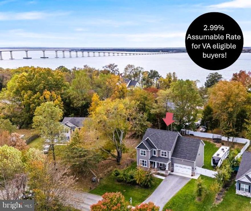 ** 2.99% Assumable Rate for eligible VA buyers! ** Welcome to this beautifully designed Craftsman-style home, built just 3 years ago. This home has seasonal waterviews of the Potomac River offering plenty of space for living, entertaining, and relaxing. Step inside to a bright and inviting floor plan. The family room flows seamlessly into the eat-in kitchen, featuring stainless steel appliances, granite countertops, custom cabinetry  and a charming breakfast nook.  A separate dining room provides the perfect setting for gatherings, while a private office offers a quiet space for work or study. Upstairs, the primary suite features a luxurious bathroom with a soaking tub, fully tiled walk-in shower, and large walk-in closet. Convenient laundry access is available from both the primary bathroom and hallway. Three additional bedrooms and a full bath complete this level. The fully finished basement adds ample living space, including a recreation room, flex area perfect for a home gym or guest suite with a full bath. The exterior showcases beautiful landscaping and curb appeal. A door off the kitchen leads to the spacious backyard, complete with a patio, sun sail for shade, shed and fully fenced-in yard — ideal for outdoor entertaining, gardening, or keeping pets. The property even includes a chicken coop and plenty of room to park an RV. Attached two-car garage for parking your vehicles. Located in the waterfront community of Cliffton on the Potomac with No HOA and No restrictive covenants. Plenty of options for shopping and dining only 15 minutes to the Town of La Plata and 10 minutes to King George, VA via the new Harry Nice Bridge. Schedule your showing today!