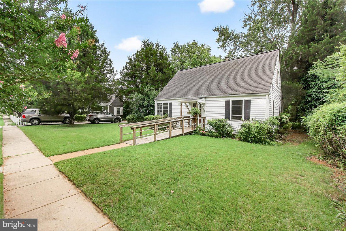 Welcome to 702 Westover Road. This freshly painted 4-bedroom, 1-bathroom Cape Cod is situated on a well-maintained and spacious lot in the desirable Sudbrook Park neighborhood. The home offers fresh paint throughout, newly refinished hardwood floors, and new kitchen flooring. The main floor offers abundant natural light, a generous living room, an eat-in kitchen with ample cabinetry and counter space, two bedrooms, and a full bath. The kitchen provides direct access to a bright sunroom overlooking the expansive rear yard. Upstairs, there are two additional bedrooms with hardwood flooring. The exterior features extensive green space offering multiple possibilities for outdoor enjoyment. This move-in-ready property is conveniently located near shopping, restaurants, and major commuter routes, making it an excellent option for new homeowners seeking both comfort and accessibility.