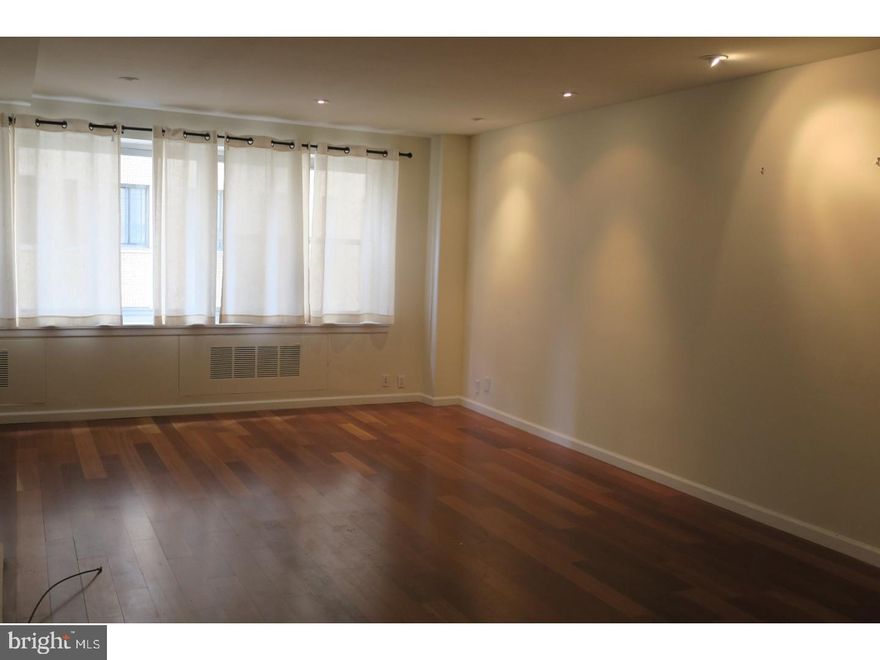 Renovated one bedroom, one bathroom residence with hardwood floors and southern views! Enter the condominium through a welcoming, spacious foyer with coat closet. The living room has ample space to entertain and leads into a separate, yet open dining area. The renovated galley kitchen has a tile floor, wood shaker cabinetry with stainless steel bar pulls, subway tile backsplash, granite counters, Bosch stainless steel dishwasher, GE stainless steel range and Fisher and Paykel stainless steel refrigerator with freezer on the bottom. The spacious bedroom has recessed lighting and a ceiling fan. There is a designer bathroom appointed with stone tilework with a double vanity and a whirlpool shower/tub with a seamless glass door. All utilities included in rent.