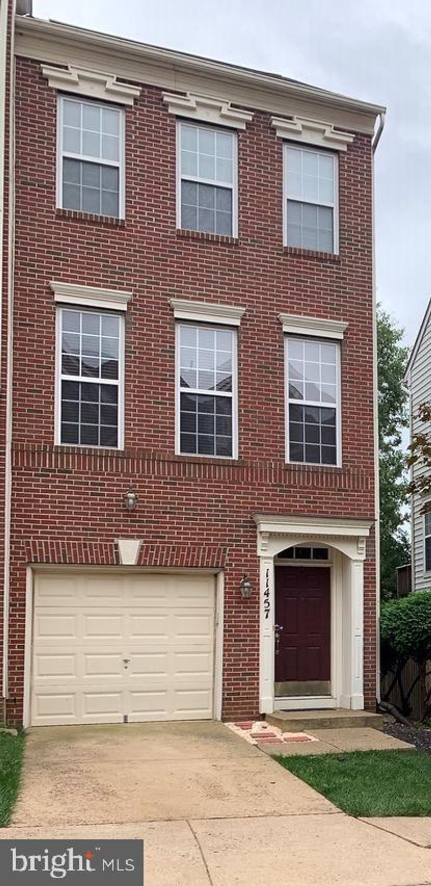 Highly sought after Ridge Top Community. This property is a three level, end unit, brick front townhouse. 
This home has been recent updates to the kitchen and bathrooms.  Open floor layout, 2 large bedrooms and bathrooms, hardwood floors throughout, high basement ceilings & fire place. 
Located close to the Wegman's grocery store , Fairfax corner shopping center and major roads Rt 50 and Route 66.