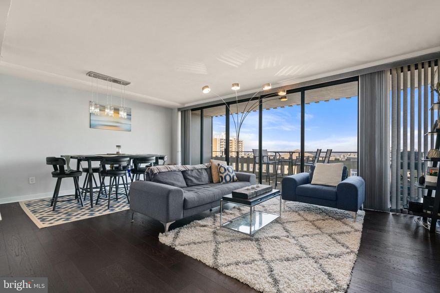 GORGEOUS RENOVATION! Wall to wall, ceiling to floor windows! Massive Balcony with amazing 14th floor  view of Alexandria! Bamboo floors though-out, Samsung Stainless Steel appliances, quartz countertops. Kenmore Elite washer/dryer, BEAUTIFUL baths w/ rainfall shower-heads. Giant master walk-in closet,+ extra storage! Assigned parking space in garage is protected +extra parking available. Pool, tennis courts,24 hr concierge. Close to shopping. Easy access to 395 & 495.