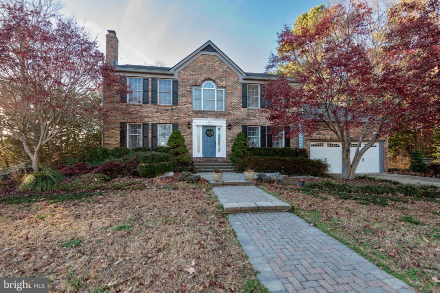 One of the best lots in Breton Bay with gorgeous views from all angles and a short walk to the community beach. This well maintained 3750 square foot home sits on .66 of an acre on the golf course at Breton Bay.  The tranquil setting lends itself to quiet relaxing and easy outside entertaining with hard scape and decks with stunning views.  This traditional style home welcome you to the main living level, which offers spaces for dining and entertainment centered around an updated gourmet kitchen a professional 52 inch stove and separate bar area with a sink and beverage cooler.  The kitchen has a generous area for eating or game night.  Kitchen features stainless steel appliances  and granite counters. The cozy family room sits just off the kitchen with a gas fire place,  is great for entertaining and allows guest to spill out to the deck and hardscaped patio with a hot tub hook up, patio fireplace,  and lush back lawn. The main level has a separate living room with a gas fireplace, an office, and separate dining room.   4 bedrooms upstairs with a newly renovated master bathroom with a HUGE walk-in shower with dual shower heads.  The basement is 77.5% finished with a bedroom or office space,  laundry area, and entertaining space.  There is an in-ground electric dog fence installed on the property
Breton Bay Civic association for $75.00 offers a one year membership with access to the beach, pier, pavilion, with grills, picnic tables, firepit, playground, and walking trails.  Breton Bay Golf and country Club offers public golfing, pool and tennis membership with swim team and children's summer programs.   The surrounding area offers stunning parks, and miles of waterways for boating, fishing and leisure activities.  
This is an excellent property in an idyllic setting si what you have been looking for!!!