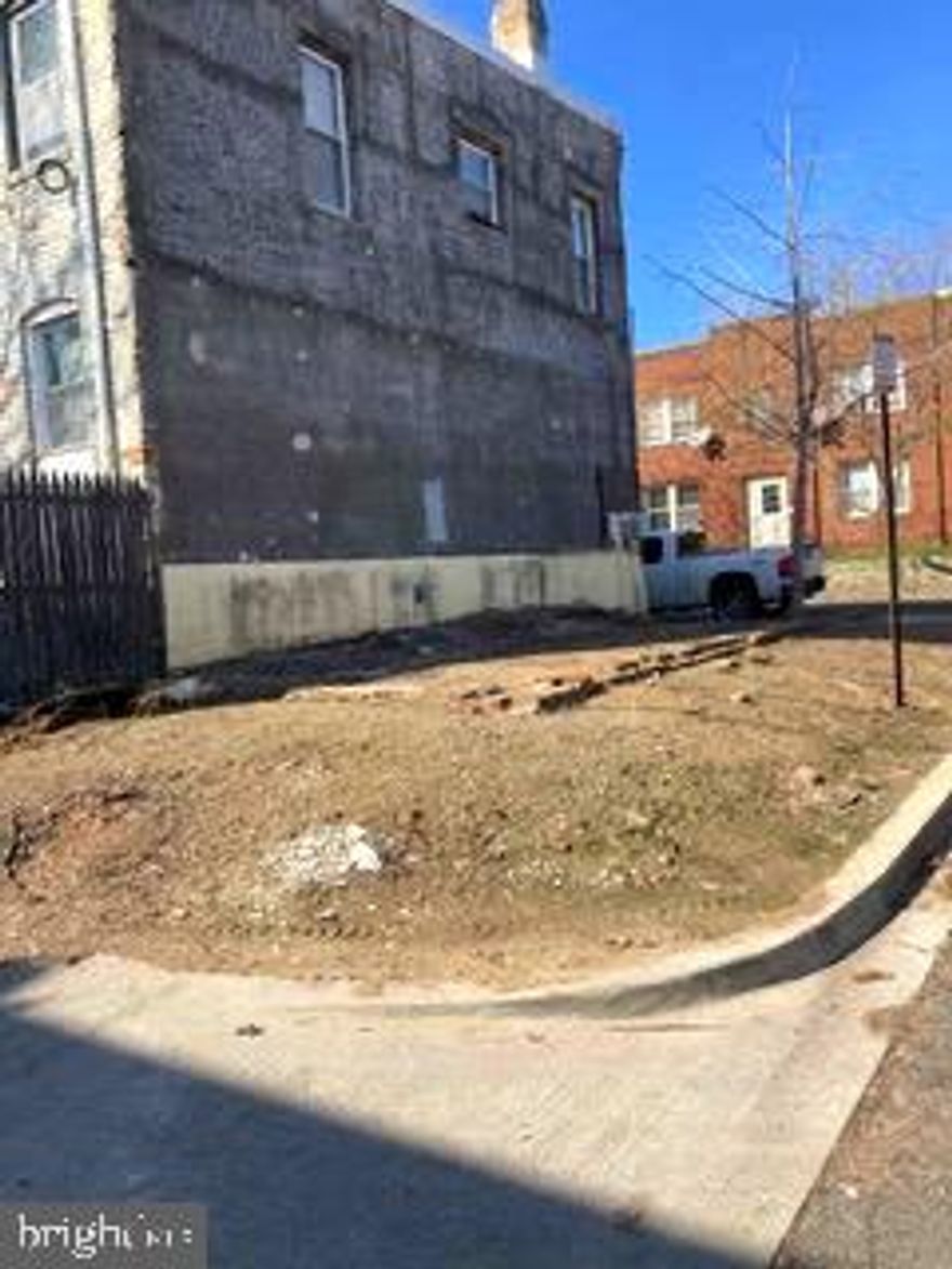End row lot, 541 sq ft, dimensions 12x 45, +/-; Zoning is RF-1, formerly 2043 Rosedale St NE, foundation of old 12x30 building 
<4526-51 PROPERTY QUEST.pdf>
footprint remains; same as 2041 and 2039 Rosedale. 4 blocks from the new Stadium Complex site. In Kingman Park Historic District.
In Kingman Park Historic District. Note that 2039 Rosedale St NE was purchased for 285k in shell condition one year ago.
Seller will allow contracting party to obtain variances, building and trades permits etc prior to settlement, and may also consider owner financing for the right prospect.