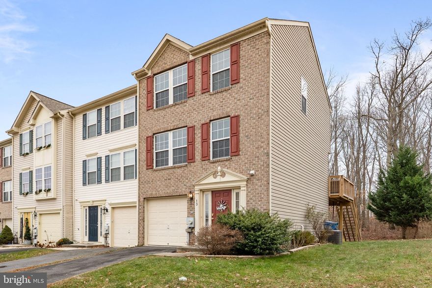 Nestled in the charming Ridgely Forest community, this delightful end-of-row townhouse offers a perfect blend of comfort and modern living. With 1,948 square feet of thoughtfully designed space, this home features an inviting open floor plan that seamlessly connects the kitchen and dining areas, ideal for gatherings and everyday living. The eat-in kitchen, complete with an island and breakfast area, providing ample space for meal prep and casual dining. The family room, conveniently located off the kitchen, creates a warm atmosphere for relaxation and entertainment. With three spacious bedrooms and one and a half bathrooms, this home accommodates both privacy and convenience. The fully finished walkout basement adds valuable living space, perfect for a home office, playroom, or media area. Enjoy the community's in-ground pool, a wonderful spot for summer fun and socializing with neighbors. The attached garage and driveway provide ample parking, ensuring ease of access. Schedule your private tour today!