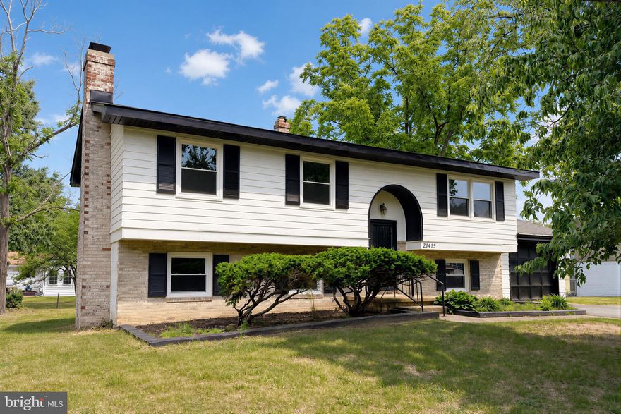 Check out this split foyer home conveniently located just minutes from NAS Pax River, parks, schools, shopping, and dining. This home has seen several recent updates, including a new roof, new windows, fresh interior and exterior paint, updated flooring in the lower level and bathrooms. The main level offers a living room, dining area, kitchen, primary bedroom with attached full bath, two additional bedrooms, and a second full bathroom. Off the dining room, the screened porch overlooks the spacious backyard and provides a comfortable outdoor space to enjoy. The lower level includes a family room with wood burning fireplace, a fourth bedroom, third full bathroom, and an additional room with backyard access that could function as an office, guest room, or flex space. An attached one-car garage offers extra storage or workspace potential. With some solid updates, a functional layout, and a convenient location, this home offers a great opportunity for its next owner.