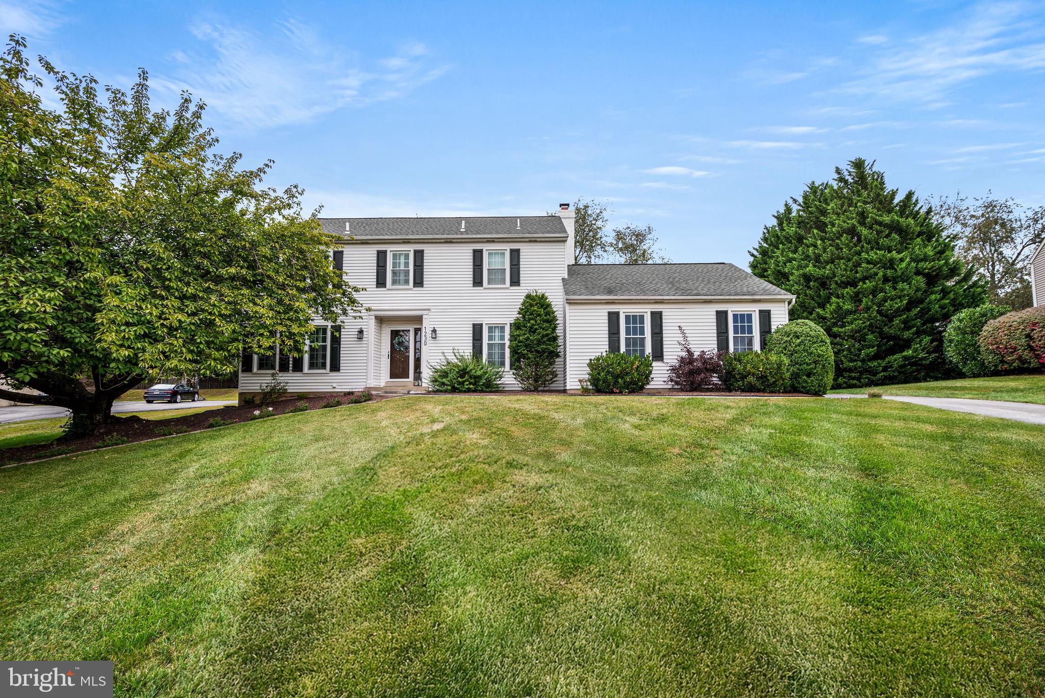 Absolutely stunning! Welcome to this beautifully renovated home, located in a lovely neighborhood. Inside this classic Colonial, you'll find stunning hardwood floors, plantation shutters, wood blinds, and an abundance of windows that fill the space with natural light while offering picturesque views of the landscaped yard.
As you step inside, you're greeted by an elegant foyer with two convenient coat closets. French glass doors lead into the formal living room, currently used as an office. The floor plan and flow are perfect for entertaining, with a generously sized formal dining room ideal for both intimate gatherings and larger celebrations. The updated kitchen will delight any chef, featuring quartz countertops, stainless steel appliances, and plenty of cabinet and counter space. The bright breakfast area opens to a spacious family room with a cozy wood-burning fireplace, perfect for those chilly evenings. Off the family room, enjoy an added bonus: a screened-in porch that’s perfect for al fresco dining.
Upstairs, you'll discover a spectacular primary suite, complete with a beautifully renovated spa-inspired bath with a double vanity. The walk-in closet is a dream, featuring built-in cabinets, drawers, and shelves for ultimate organization. Three additional good-sized guest bedrooms each offer generous closet space and share an updated hall bathroom.
The partially finished lower level provides flexible living space with a bar area, cedar closet, and multiple storage options. The unfinished section of the basement offers even more room for storage.
The large, fully fenced backyard is a true outdoor oasis. Enjoy a spacious, two-level paver patio that offers ample room for seating and dining areas - perfect for sipping morning coffee or unwinding after a long day. A handy storage shed provides plenty of room for your lawn and garden tools.
Conveniently located just a short distance from the vibrant heart of West Chester Borough, with its renowned dining, specialty shops, and community events, this home offers an exceptional opportunity you won't want to miss!