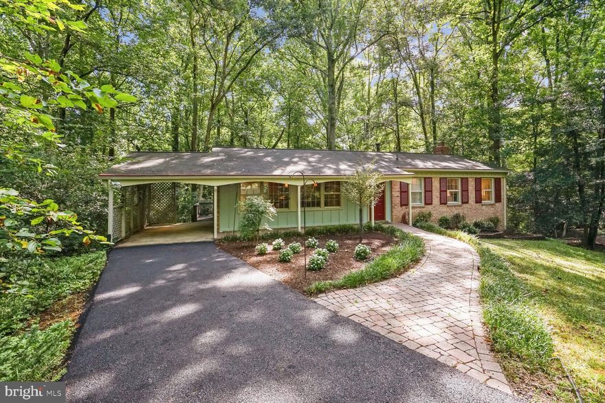 Stunning rambler with everything renovated for you!!! Absolutely gorgeous kitchen with soapstone counter tops, huge island with sink looking out the front windows, stainless steel appliances, more storage than you could ever imagine with a whole entire wall of floor to ceiling cabinets. All of this open to the dining area that can comfortably seat 8 people! All three, full bathrooms have just been renovated top to bottom!!!! Gleaming, rich, hardwoods throughout the main level. A wall of glass in the large living room opens to an expansive, elevated deck overlooking your private, half acre plus lot that backs to woods with trails and streams. The lower level with fireplace and even more storage, two additional bedrooms and a full renovated bath, walks out to your own private oasis! All of this is tucked away on an exclusive cul-de-sac  of oversized lots but has easy access to major commuting routes, Reston Metro, and all of the amenities that fabulous Reston has to offer. Also close to Reston Town Center with fabulous restaurants and seasonal events!