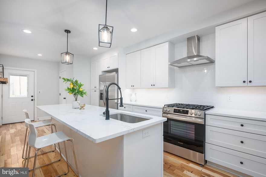 Welcome to 903 S Highland Ave, beautifully renovated CHAP home , a perfect combination of historic charm and modern luxury in a prime Canton location.

The main floor features solid hardwood floors, exposed brick, and floating reclaimed wood shelves. The kitchen boasts shaker-style cabinets, a sleek backsplash, and quartz countertops, complemented by a convenient half bath.

Upstairs, enjoy two bedrooms, including a master suite with a luxurious en-suite bathroom featuring custom tile.

The finished lower level adds a bedroom, a full bath, and a versatile den—ideal for a home office or workout space. All-new mechanical systems offer peace of mind.

Step outside to a rooftop deck with maintenance-free Trex material and a private fenced-in courtyard perfect for relaxation and entertaining.

CHAP tax credit is  approved at $190,000 pre-improvement appraised value, offering significant savings for the new owner—thousands of dollars annually for 10 years. Additionally 4 year home warranty is offered on all major appliances and mechanical systems.

Discover exceptional value and style in Canton. Schedule your viewing today!