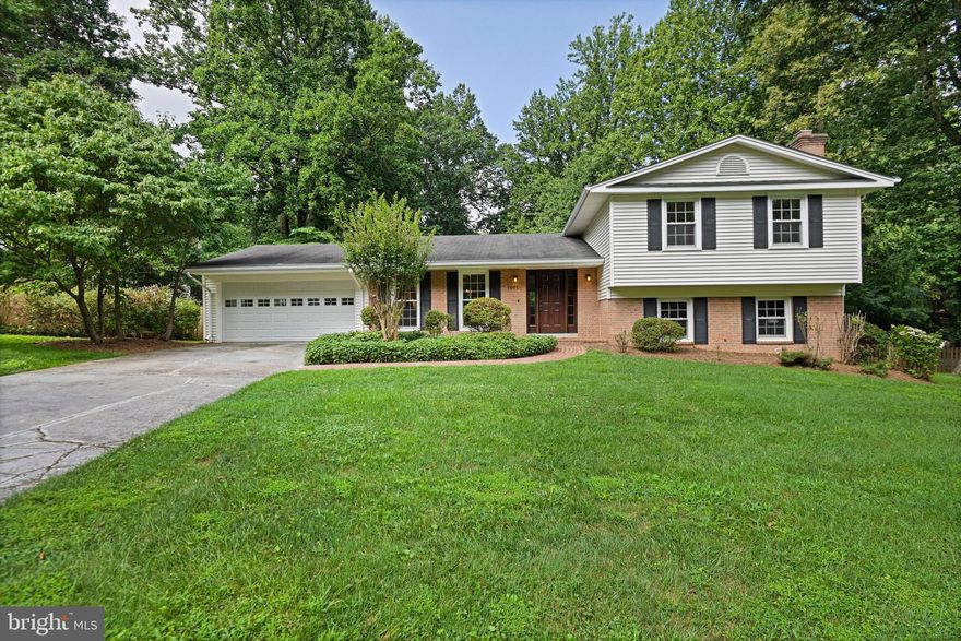 Less than a mile from the Vienna metro on a quiet cul-de-sac. This is a dream 5 Br/3 Ba + 2-car garage home! Enjoy your massive flat backyard, ideal for entertaining and play, or walk across the street to Vienna Aquatic Swim Club for a dip (pool membership may be sold/transferred to new owner).  Fully painted throughout in 2025 + brand new HVAC. Remodeled top to bottom, with hardwood floors and recessed lighting across all levels. Gourmet kitchen features quartz counters, SS appliances - opens to dining area and eat-in space w/pantry.  Walk-out main level to wood-deck overlooking backyard.  All bedrooms are huge, including primary BR w/en-suite BA (double-vanity + spa shower) and large walk-in closet. Expansive and bright lower-level rec. room has full-sized windows, built-in bookcases + a wood-burning fireplace.  5th bedroom is on the lower-level w/walk-out and full bathroom - perfect for guests. Ample storage throughout. Walk to Marshall Road ES and the Vienna Aquatic Swim Club. Quick drive to the town of Vienna and a straight shot onto I-66.