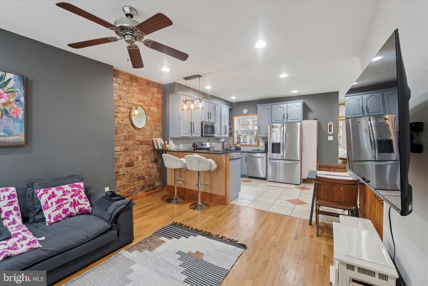 Welcome to 1522 Brown Street #1, a stunningly updated bi-level condo that perfectly blends historic Philadelphia character with sleek modern luxury. Situated at the crossroads of Fairmount and Francisville, this 2-bedroom, 2-bathroom residence offers a versatile open-concept floor plan designed for the sophisticated urban dweller. The main level greets you with soaring ceilings, rich hardwood floors, and a classic brick accent wall framed by oversized windows that flood the space with natural light. The chef’s kitchen has been thoughtfully upgraded with brand-new stainless steel appliances, granite countertops, and ample cabinetry, flowing seamlessly into the dining and living areas.

The primary suite is a peaceful retreat featuring dual closets and direct access to a rare urban sanctuary: a massive private patio. This expansive outdoor space is ideal for alfresco dining, gardening, or relaxing with morning coffee. Descend to the lower level to discover a true showpiece—a brand-new designer bathroom complete with a luxurious copper soaking tub and an electric fireplace for a spa-like atmosphere. This level also hosts a versatile second bedroom, a dedicated laundry area, and a large bonus space perfectly suited for a home office, media lounge, or private gym.

Offering unmatched flexibility, this home can be delivered fully furnished for a turnkey move-in or unfurnished to suit your personal style. Exceptional value is found in the low monthly condo fee of just $194, which covers water, master insurance, pest control, and exterior building maintenance. Located within walking distance to the Art Museum, Center City, the Broad Street Line, and the vibrant cafes and shops of Fairmount Avenue, this condo offers a high-design lifestyle in the heart of it all.