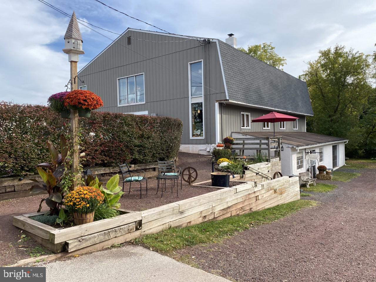 Have you ever considered yourself in business for you? This opportunity to join us in Historic downtown Skippack is the perfect time to do it. Enjoy the heart of Skippack and one of the best locations with other upscale businesses in Green Wolf's Village Barn. This is regarded as one of the oldest retail destinations since 1969 and has been a popular attraction for visitors for many years. This will allow you the chance to be part of this charming village and enjoy making a successful business opportunity work for you. Skippack Village is home to many small local businesses that take tremendous pride in their hometown work environment. Continuously growing with entertainment for all, Skippack draws upscale crowds to its charming and chic streets to enjoy live music, wine tastings, gallery openings, and many a day of planned community events; Skippack Days Arts and Crafts Festival, First Fridays, Craft Fests, Girls Night Out, French Market, Antique Car shows, and holiday Illuminaire Nights,.... just to name a few. There is never a time when something is not happening in this town. There are many eclectic boutique shops and popular restaurants to choose from, including quaint and informal ones. Also some very nice upscale choices are available for all. This unit has stained concrete floors, exposed wood beams, vintage display cabinet and counter displays with recessed lighting, ceiling fan, HVAC, ample natural light, and free off-street parking. This space is now available in a high-quality location with great visibility within this well-known establishment. The building hosts a variety of top-notch businesses in its "Barn", including a German market, a bookstore, and a fine cabinetmaking workshop. A family business with hands-on ownership manages events. Consider this convenient, Skippack Village choice location with a beautiful open space and the perfect setting for an art studio, boutique retail store, or your specialty business. Business opportunities are just excellent in this town. Various photos here show past and present shops that have been located in the Barn. Inquire today and be in by spring!