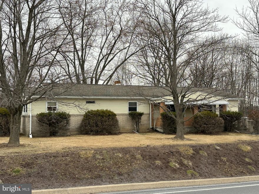 One level living located close to the Philipsburg-Osceola elementary school and minutes from downtown and shopping. Situated on a level half acre lot with great parking. Very large living room with a woodstove for the cold winter days and there is another woodstove in the unfinished basement. The family room currently has the laundry hookups but they could be relocated to take advantage of additional living space. The covered front porch is very comfortable to relax on those summer and fall evenings. The unfinished basement includes the one car garage and lots of extra storage space.