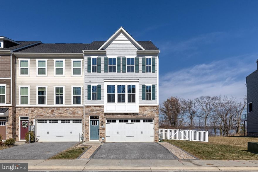 Luxury Meets Custom Design in Shaw’s Discovery

Welcome to 3070 Shaws Rd, a stunning, one-of-a-kind end-unit townhome in the gated waterfront community of Shaw’s Discovery. Built in 2020 by Ryan Homes, this property has been transformed with high-end, custom upgrades that set it apart from the standard model.

Offering 4 bedrooms, 4.5 bathrooms, a 2-car garage, and three outdoor living spaces, this home is so spacious and thoughtfully designed that you’ll forget you’re in a townhome!

Step inside to find LVP flooring throughout all four levels, creating a seamless, modern aesthetic. Designer lighting, upgraded mirrors, and stylish kitchen hardware elevate the space, while the expansive fourth-floor “speakeasy” leads to a rooftop deck with breathtaking views of Back River. The premium lot offers a fully fenced yard, an outdoor fireplace, a custom shed that matches the home’s exterior, and a children’s play area, making it both beautiful and functional.

Shaw’s Discovery provides the perfect blend of privacy and community with gated security, a community pier, walking paths, picnic areas, and a boat ramp, ideal for those who love waterfront living. With its prime location, water views, and exceptional upgrades, this is a rare opportunity to own a truly custom home in one of the area’s most sought-after newer communities.