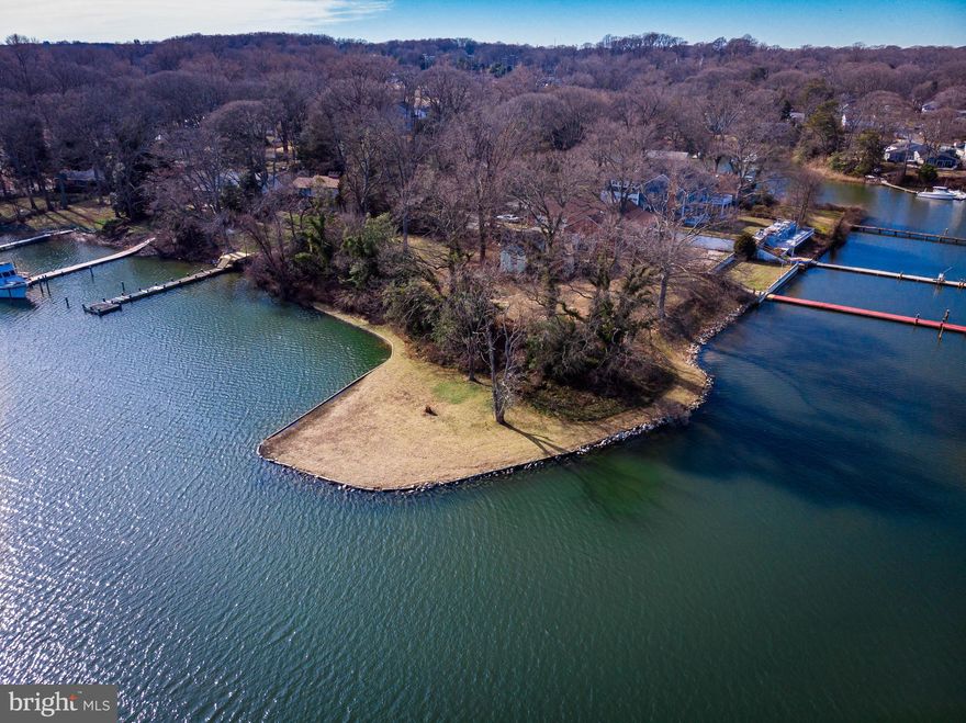 Welcome to your exclusive waterfront paradise nestled within the picturesque Cape Saint Claire community of Annapolis, Maryland. Behold this rare gem - a sprawling peninsula lot embracing the serene waters of the Little Magothy Creek. Located in the Broadneck school district.
Craft your dream retreat amidst breathtaking natural beauty, where the tranquil rhythm of the creek meets the endless possibilities of coastal living. Imagine waking up to the gentle lapping of waves against your private shoreline, surrounded by lush greenery and the soothing symphony of nature.
Indulge in unparalleled waterfront luxury as you design your custom-built haven, boasting panoramic views that stretch across the glistening creek waters. Whether you envision a sleek contemporary masterpiece or a charming coastal cottage, this blank canvas invites you to create your own waterfront legacy.
Embrace a lifestyle of leisure and recreation, with direct access to boating, fishing, and water sports right from your doorstep. Explore the nearby Chesapeake Bay, renowned for its sailing adventures and scenic cruising grounds, or simply unwind on your own private dock, watching the sunset paint the sky in hues of gold and crimson.
Nestled within the esteemed Cape Saint Claire community, enjoy the added benefits of water-privileged amenities, including beaches, marinas, and community parks. Delight in the camaraderie of neighbors and the vibrant social scene, while still relishing in the privacy and seclusion of your own waterfront sanctuary.
Seize this unparalleled opportunity to own a piece of waterfront paradise in one of Maryland's most coveted locations. Embrace the allure of waterfront living and let your imagination run wild on this extraordinary peninsula lot on the Little Magothy Creek. Your waterfront oasis awaits.