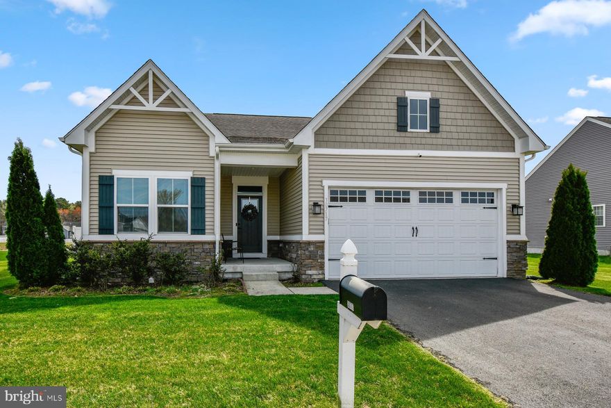 Welcome to 30717 Hawks Way in the Heron Ponds community of Delmar, MD — a beautifully designed home that perfectly blends comfort, space, and serene water views.

Offering 3 bedrooms and 3 full bathrooms, this thoughtfully laid-out home also features a private office with elegant French doors, ideal for working from home or creating a quiet retreat. The main living area showcases an open-concept design, filled with natural light and stunning views of the community pond, creating a peaceful backdrop for everyday living.

The kitchen is a true standout, complete with granite countertops, a striking tile backsplash, stainless steel appliances, and a convenient pantry for extra storage. Just off the kitchen, the living room invites you to relax by the cozy fireplace, while the nearby laundry room adds everyday convenience.

The primary suite is a retreat of its own, featuring tranquil water views, a spacious walk-in closet, and an en-suite bathroom with double vanities and a walk-in shower.

Upstairs, you’ll find a versatile bonus space perfect for a family room, playroom, or media area, along with an additional bedroom, full bathroom, and a dedicated furnace/storage room. Throughout the home, multiple storage closets ensure everything has its place.

Step outside to enjoy the expansive backyard, fully enclosed with a vinyl fence for privacy and peace of mind. The deck overlooks the picturesque pond, where you can take in the sights of local wildlife like ducks and herons. The yard is maintained with an irrigation system fed by the community well at no cost to the seller. With garden beds already in place and plenty of room to play or entertain, this outdoor space truly completes the home. This home also includes a garage, providing added convenience for parking and additional storage.

This is the perfect opportunity to enjoy spacious living with beautiful water views in a welcoming community!

This home was constructed by Ryan Homes (Alberti Model Elevation K) and also features an encapsulated crawlspace.