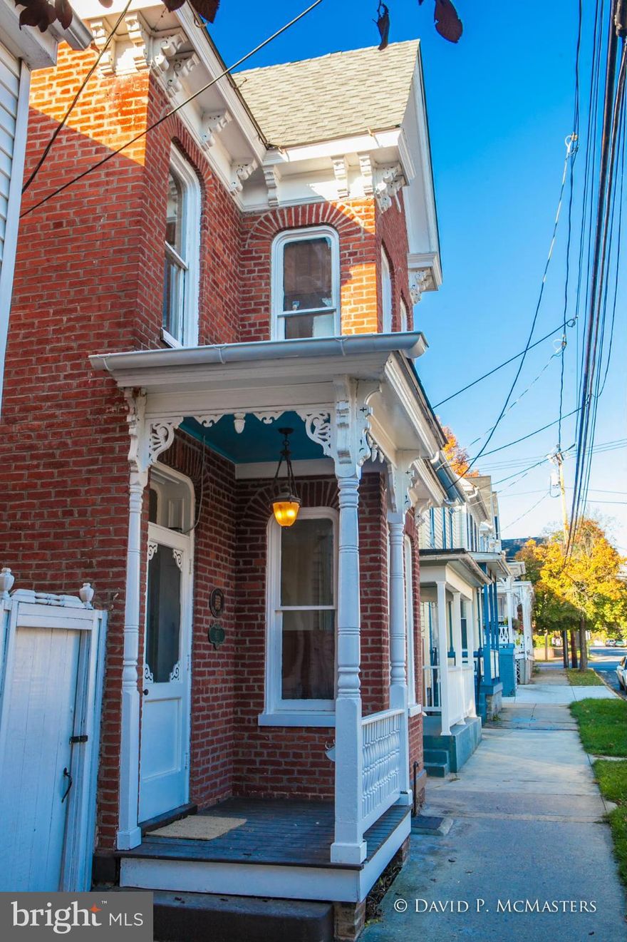 Charming all brick Victorian on West Burke St across from the Burke Street School. Nice  in-town neighborhood.  2014 renovated. All new bath, kitchen, s/s appl kitchen. washer, dryer.  Nice interior details; woodwork, moldings, built in china cabinet.  Wood floors. Old barn in rear usable as 2 car garage.  Natural gas heat. 3 blocks from MARC train to DC and "federal" MD 'burbs. 3 min I-81