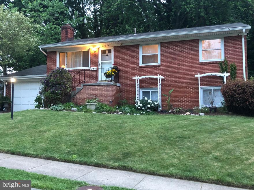 Ready to move in, 13134 Haddock road has been well loved and recently brought up to date and made ready for a new owner.  Brick exterior. This home offers 2 levels of spacious living, easily creating a separate space in the basement for an in-law suite. The beautiful addition on the back of the home includes a large family room with gas fireplace and stained glass window accents. There is also an additional bedroom (could be upstairs sunroom) and deck. 

The garage has been finished with a finished room to the back of the garage but could be taken back to a 1 car garage with workshop by the new owners. There is a whole house fan . The HVAC system has been recently serviced and the ductwork cleaned. 

The basement is finished with ceramic tile/laminate and includes efficiency hookups for a small kitchen, just under the stairs. There is a full bathroom on this level. The basement includes another family room with wood-burning fireplace  and also a large sunroom off the back of the basement with outside access to the fenced back yard that backs to a wooded and private park. There ai also a large storage shed that conveys. This home is close to schools, shopping and doctors.