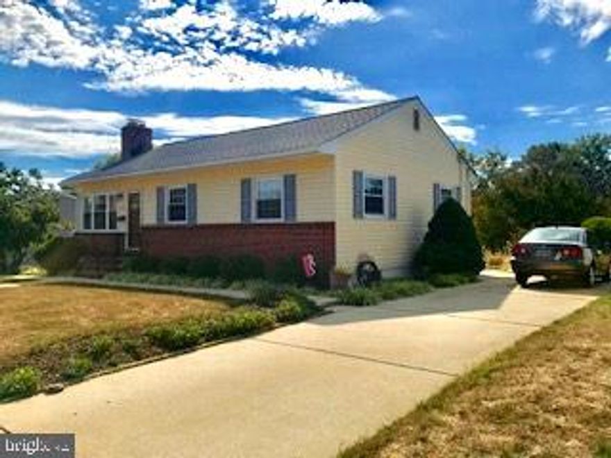 LOCATION/LOCATION/LOCATION!  Move in Ready!  there's nothing to do but unpack! Beautiful REAL Hardwood floors in ALL Bedrooms and Under the Living Room carpeting. Wood Burning Fireplace adds charm and character in the Living Room.  Separate Dining Room adjoins Kitchen for that "Open" feeling" Updated Bathroom and Kitchen with ALL Appliances conveying. BRAND NEW Architectural Roof w Warranty! New Upgraded Electrical Panel! Maintenance Agreements in place on HVAC to assure Tip-top performance! LARGE and Open Full Basement is awaiting your finishing touches! Large fenced backyard with patio overlooking the lush flowering gardens and well manicured trees is the perfect setting for your next bonfire. Convenient to shopping, restaurants and a central, easy commute to Balto/DC/Ft. Meade/Annapolis.