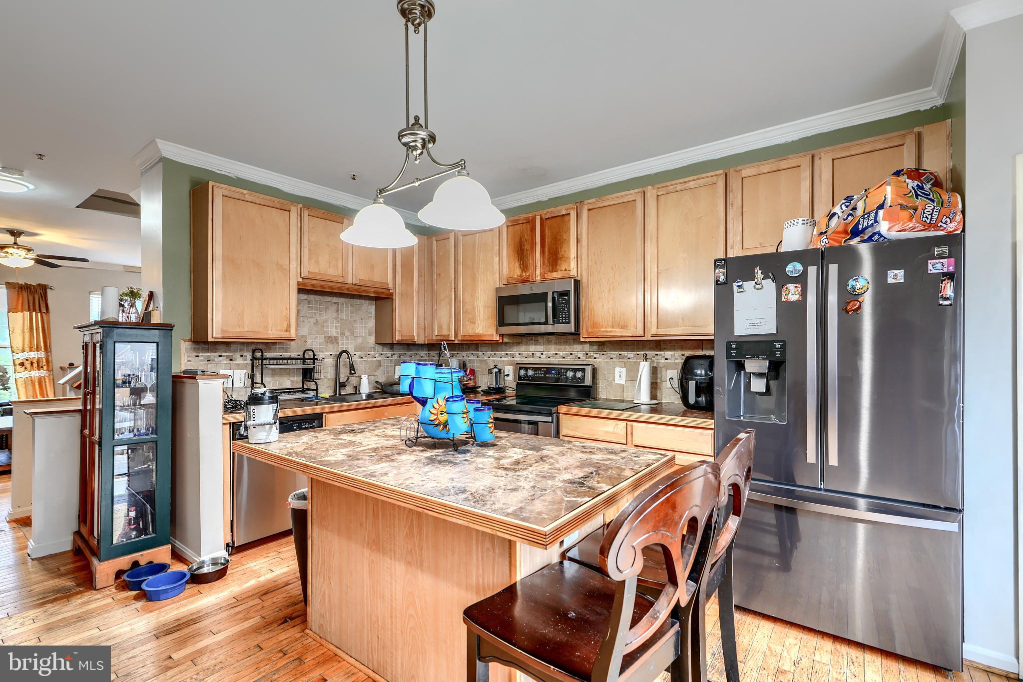 Welcome to this meticulously maintained townhouse, ideally located in the community of Carrollwood Manor. This spacious residence boasts five generous bedrooms and three full bathrooms, offering ample space for comfortable living. Step inside and discover elegant hardwood flooring that flows throughout the main living areas, adding a touch of sophistication. The heart of the home features a well-appointed kitchen complete with sleek stainless steel appliances, perfect for the culinary enthusiast.
The master suite offers a spacious walk-in closet and a master bathroom. Indulge in the convenience of a double vanity, a separate shower, and a relaxing tub, providing the perfect sanctuary after a long day. Enjoy outdoor living on the nice-sized deck, ideal for entertaining guests or simply unwinding in the fresh air. This well-maintained townhouse presents an exceptional opportunity for those seeking a blend of comfort, style, and a prime Carrollwood Manor location.
Schedule your showing today!