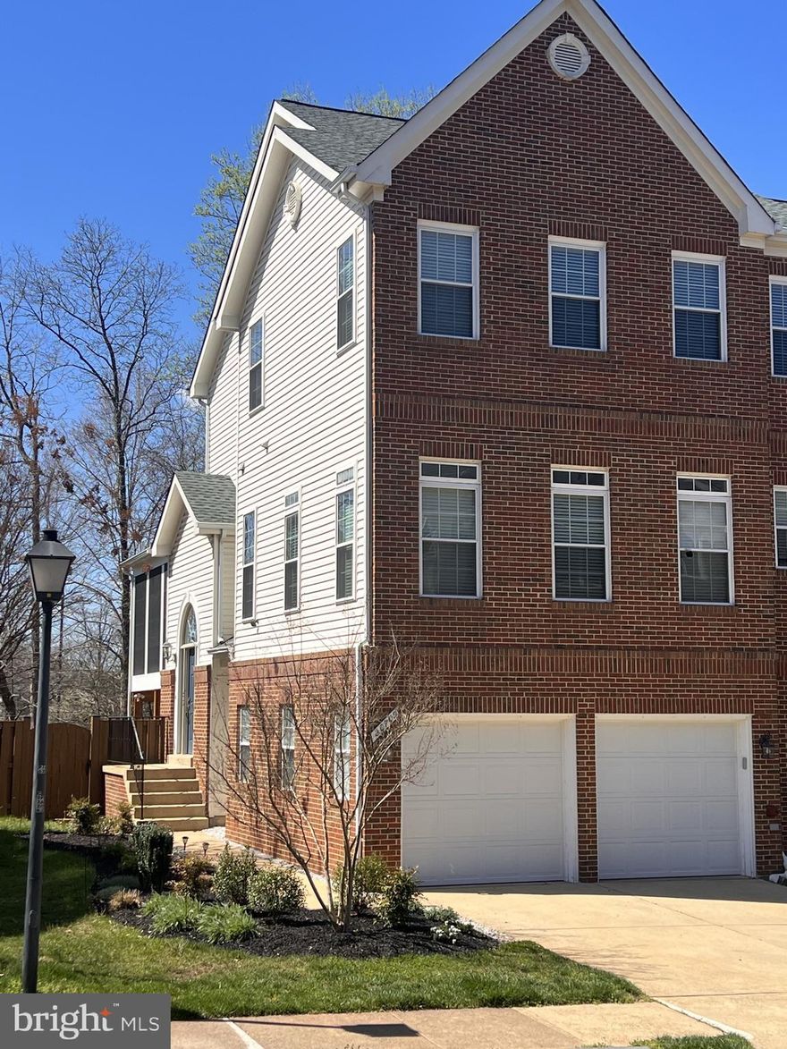 WELCOME HOME to this Meticulously maintained End Unit Townhome in sought after Lowes Island. The owners have thoughtfully included every feature and intricate detail to ensure tranquility, comfort, and pure pleasure during those days at home. This home is a chef and entertainer's dream which includes over 2700 finished square feet, 3-fully finished levels, 4-season enclosed deck, and a finished walk-out basement to landscaped backyard with privacy fencing that backs to trees. 

This 2-Car Garage End Unit Townhome includes entry through the garage and front main entry.  The Main Level features an open floor plan with stunning hardwood flooring, expansive living room with gas fireplace. Linger to the 4-season deck with cooling and heating elements coupled with open adjoining deck for grilling.  The kitchen is huge with stunning granite coutertops, bar, stainless steel appliances, induction range, built-in oven and microwave, refrigerator with ice maker and water dispenser. Delight in the morning sun in the breakfast room and huge dining area.

The Upper Level includes a large Primary Suite with Walk-In closet, convenience of a stacked Washer and Dryer, and an adjoining Primary Luxury Bath with Dual Vanities and Heated Floors. Additional oversized 2 Bedrooms and Full Bath.

The Lower Level is Fully Finished and Improved Walk-Out Basement includes plush carpet, warmth of an additional gas fireplace, a projector and screen for movie and sports nights, a full bath, and hookup for an additional washer and dryer, if desired.