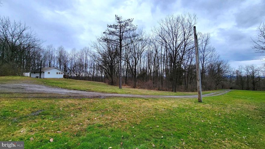 Such a great opportunity 9.03 acres in Fleetwood School District.  Driveway is already in place.  Electric service is operational.  Cleared open space surrounded by woods.  This property has served as a club meeting place for the past  65 years for the Walnuttown Fish and Game Association.  A small building currently sits in the open space.  Electric service is hooked up. Outhouse is operational.    NO Water, NO Sewer
Bring your boots and come check out this property!