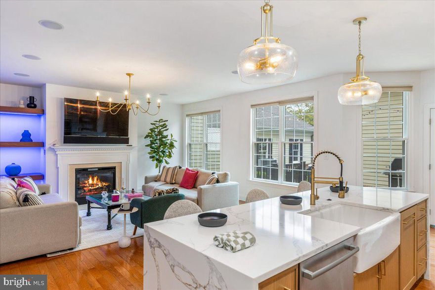 Discover exceptional value and refined living in this expansive four-bedroom townhouse - the
largest model available in the sought-after Newtown Walk community. Perfectly priced to sell,
this residence offers over three finished levels of versatile living space in the heart of vibrant,
walkable Newtown, PA. A sunlit entrance hall welcomes you into the home’s chic interior, where
gleaming hardwood floors flow through open living and dining areas. At the center, the newly
renovated chef’s kitchen is a showstopper with a waterfall quartz island, custom built-ins,
designer backsplash, porcelain farm sink, and a built-in 48" GE Monogram refrigerator. Just off
the kitchen, the family room offers warmth and character with a gas fireplace, detailed millwork,
floating shelves, and surround sound. Step onto the rear deck for effortless indoor-outdoor
entertaining. The thoughtful floor plan includes a newly refreshed main-level guest suite in its
own private wing—perfect for visitors or extended family. Upstairs, the Owner’s Suite is a
tranquil retreat with two walk-in closets and a spa-inspired bath featuring a soaking tub and dual
vanity. Two additional spacious bedrooms and a full hall bath complete this level. The third floor
offers endless flexibility as another bedroom, playroom, or private study, while the massive
basement with 9’ ceilings delivers unmatched bonus space, including a cedar closet, rough-in
plumbing for a bath, gym potential, and abundant storage. Combining size, style, and function in
one impressive package, this home stands within the top-rated Council Rock School District. Just
minutes from acclaimed restaurants, boutique shopping, coffee houses, salons, and award-
winning fitness studios, it places the very best of Newtown at your doorstep. Spacious, stylish,
and priced to sell, 206 Paxon Aly is your opportunity to own the perfect blend of upscale living
and ultimate convenience.