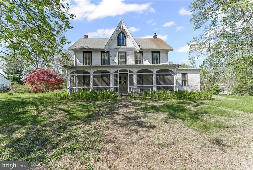 Up a long tree lined driveway off Rt. 926 sits this iconic and historic Chester County farmhouse – The Patton House. Owned by the same family since the 1940’s, this lovely 3-acre property is a part of Unionville history and is filled with possibilities.  The main house has over 3500 square feet including two kitchens, 5 bedrooms, 2 ½ bathrooms, 2 living rooms, a dining room and so much more.  Convert one kitchen and bath to a first floor primary? Continue with multiple generational living?  The possibilities are endless. Classic features of this 1700’s farmhouse include:  floor to ceiling windows, original moldings and hardwood floors, large spacious rooms with high ceilings, front and back staircases, and an amazing front porch. Down the hill is a second house (Spring house) which is a one bedroom, one bath two story house with an open concept kitchen and living room. There are so many potential uses, ie. Live here while the main house is restored, rental income, in laws, etc. The Spring house has been closed up for years so please use caution when entering as there is some mold present. Lastly, there is a detached 3 car garage, ideal for the car enthusiast, work vehicles, machinery, farm equipment, etc.  There is public sewer and an on-site well. Bring your vision and creativity and imagine bringing this historic home back to its glory and continue the Chester County farmhouse tradition. The property is on the East Marlborough Historic Registry - check w/township for potential restrictions. Estate sale - property being sold as is.