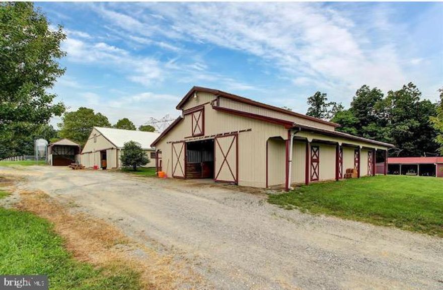 Welcome to your dream horse farm.  This wonderful property located on nearly 38 acres of fenced pastures and paddocks.  This home has so many features hard to name them all.
Outdoor track 
39 stalls
Indoor riding arena
training pool

tack rooms
horse showers
apartment in the barn