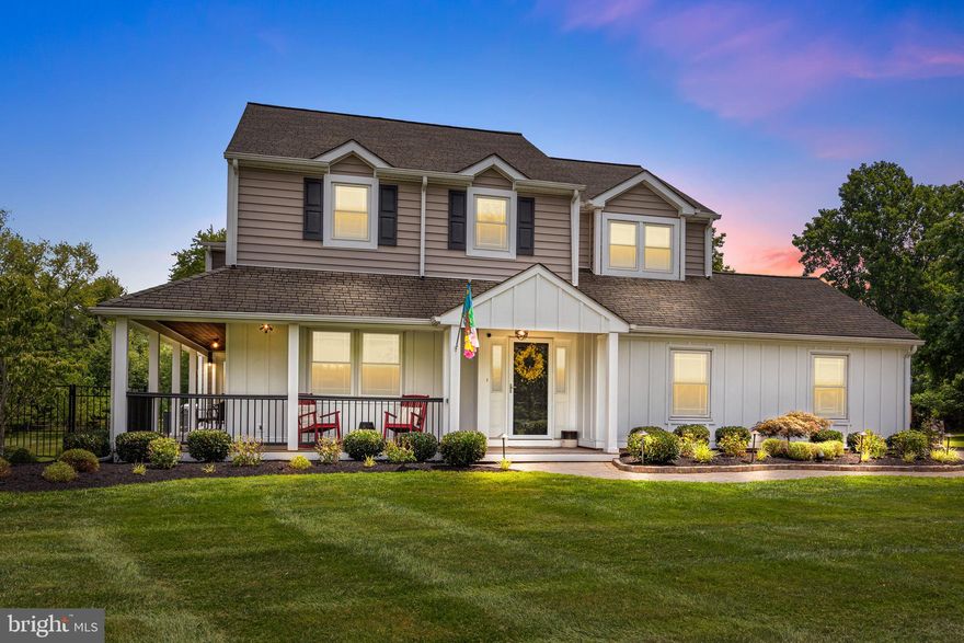 Nestled on over 1.5 acres in the highly sought-after Council Rock School District, 365 Foxcroft Drive is a pristine Colonial-style residence with a modern Contemporary flair, located in the desirable Brookwood Estates of Ivyland. This expansive property offers a rare combination of elegance, functionality, and luxurious living, featuring five bedrooms, three full and two half bathrooms, a private in-law suite, a fully finished basement, and a backyard oasis that backs to preserved open space. From the moment you arrive, the home’s impeccable curb appeal draws you in. A long driveway leads to a three-car detached garage, while a meticulously maintained front lawn and paver walkway guide you to the covered front entry. Inside, engineered hardwood floors run throughout the main level, setting a warm and sophisticated tone. The formal living and dining rooms are designed with elegant crown molding and chair rail detailing, perfect for entertaining. Flowing seamlessly into the heart of the home is the dramatic two-story family room, where a slate-accented gas fireplace and expansive windows create a bright and inviting atmosphere. Recessed lighting and custom millwork adds to the luxurious ambiance. The family room opens to a wraparound porch and a covered rear paver patio, seamlessly blending indoor and outdoor living. The chef-inspired kitchen is a true showstopper. Designed for both function and beauty, it features quartz countertops with a stylish subway tile backsplash, and an island that has a wine fridge, a second sink, a built-in microwave, and a trendy Italian marble waterfall countertop. The spacious breakfast area and walk-in butler’s pantry enhance the kitchen’s usability, while top-of-the-line stainless steel appliances—including an oversized Electrolux refrigerator/freezer and a 6-burner JennAir range with pot filler—make cooking a delight. Upstairs, four well-appointed bedrooms offer engineered hardwood floors and ample storage. The luxurious primary suite includes a private office/sitting room with a dedicated kitchenette, a massive walk-in closet, and a spa-like ensuite bathroom featuring a steam shower with river stone flooring and dual quartz vanities. The remaining bedrooms are spacious and unique—one with vaulted ceilings and another with a walk-in closet—sharing a beautifully updated hall bath with double quartz sinks and a tub/shower combo with ceramic tile surround. A conveniently located upper-level laundry room completes the second floor. In 2013, a significant addition expanded the rear of the home and added a stunning 1,800-square-foot finished basement. This level is designed for entertainment and relaxation, featuring plank-style ceramic tile flooring, a full wet bar with zinc countertops, a media room with surround sound, a wine cellar, a convenient half bath, and additional storage space. Ideal for multi-generational living, the private in-law suite has its own entrance and includes a full kitchen with quartz countertops and luxury vinyl plank flooring, a spacious bedroom, a modern full bath with oversized vanity and tub/shower, and a private laundry area. Step outside to your resort-style backyard, where a heated saltwater in-ground pool, covered patio, custom fire pit, and built-in prep area, equipped with a sink, await. With preserved land behind the home, enjoy the serenity and privacy of the expansive yard year-round. This home is a rare gem, blending thoughtful design, upscale finishes, and functional spaces both inside and out. Whether you're hosting guests, enjoying time with loved ones, or simply unwinding in your own private retreat—365 Foxcroft Drive is the perfect place to call home.