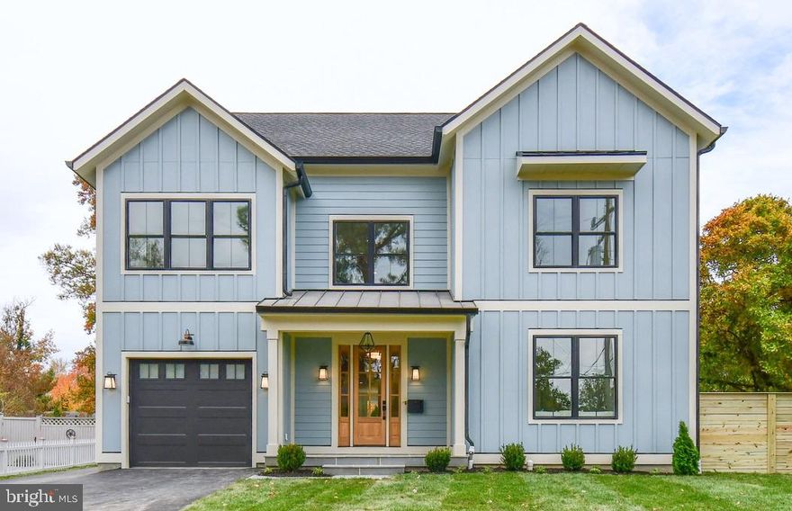 The newest custom home by The Zelaya Homes Team is now ready!  This new 3 level home sits on a level fenced lot complete with usable back yard space and privacy. It features plenty of enjoyable sunlight throughout the day. The main level features an expansive luxury kitchen. The large island can comfortably sit 4-5 together. The stainless steel premium appliance package includes a Thor 36" gas commercial grade convection range with air fryer built in. A 25.5 cu ft LG smart refrigerator that makes 4 different types of craft ice, a microwave drawer, mini beverage fridge with dual temperature zones, and Thor quiet dishwasher. Your new countertops are ultra durable quartz. Additional kitchen features showcase under and over cabinet lighting, walk-in pantry, mini bar area, custom made range hood, and excess cabinet storage. Your new family room has space for the whole family to enjoy an oversized sectional sofa and relax by your low maintenance remote controlled gas fireplace. The bedroom suite includes a full bath for guests or an office. The convenient mudroom off of the garage with side exterior access includes benches, shoe storage and coat hooks. The oversized one car garage includes a quiet door opener and 40 amp plug ready for your EV charger. Walk out to the backyard, with all new pressure treated privacy fencing and stone paver patio. One level up includes, 5 large bedrooms, 4 full bathrooms, a cute sitting/study area, and the laundry room. The owners suite includes a private bath with large 4' x 6' shower, dual rain shower heads, double vanity sink, private toilet water closet, and 6’ long, deep soaking bathtub. Surprise yourself with the 3rd floor finished loft space having a large recreational room and utility room with more space for storage. All three levels have 9’ ceilings, wide plank engineered hardwood oak floors. LED lights with dimmable switches were installed for controlling the ambience, energy efficiency and long lasting use. This home was built for comfort by including 2 HVAC zones with Nest smart Thermostats and tankless water heater with constant hot water. No shortage of storage in this home with excess storage closets on every level and walk in closets in the bedrooms. The lot was completely regraded with new sod and landscaping. A sump pump and french drain system has been installed in the crawlspace. Verizon Fios fiber optic high speed internet is available in this neighborhood. 7920 Fairfax road is conveniently located in the wonderful community of Hollin Hall Village in the Fort Hunt Area. The neighborhood and local pool host community events for all to come. It is walking distance to playgrounds, sport courts, park, coffee shop & bakery, grocery store, pharmacy, restaurants, bank, clothing stores, hardware store, the widely known Variety Store, and neighborhood pool Mount Vernon Park Association with 3 pools, 4+ acres of park area, private fishing pond, tennis courts, basketball courts, and volleyball. Just minutes from Old Town Alexandria, Belle Haven Country Club, Mount Vernon Estate, The picturesque Mount Vernon bike trail that runs from DC to Mount Vernon and easy commutes via the George Washington Parkway along the Potomac River to Downtown DC, The Pentagon, Fort Belvoir, Joint Base Anacostia Bolling, and Amazon HQ2. Located in the Waynewood Elementary School, Carl Sandburg MS, and West Potomac HS district with the bus stop being just down the street.