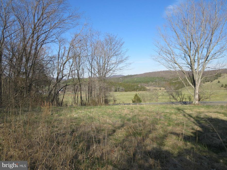 Very pretty wooded acreage with gentle rolling contours, great views from this 13 acres just 1/4 mile North of intersection of Senedo Rd & Orkney Grade.  Corners on Senedo marked.  Property consists of Tax Map# 078 A 020 containing 12.038 acres and Tax Map# 078 A 022A containing 1.131 acre.  Stop and take a look, Aerial in Docs.