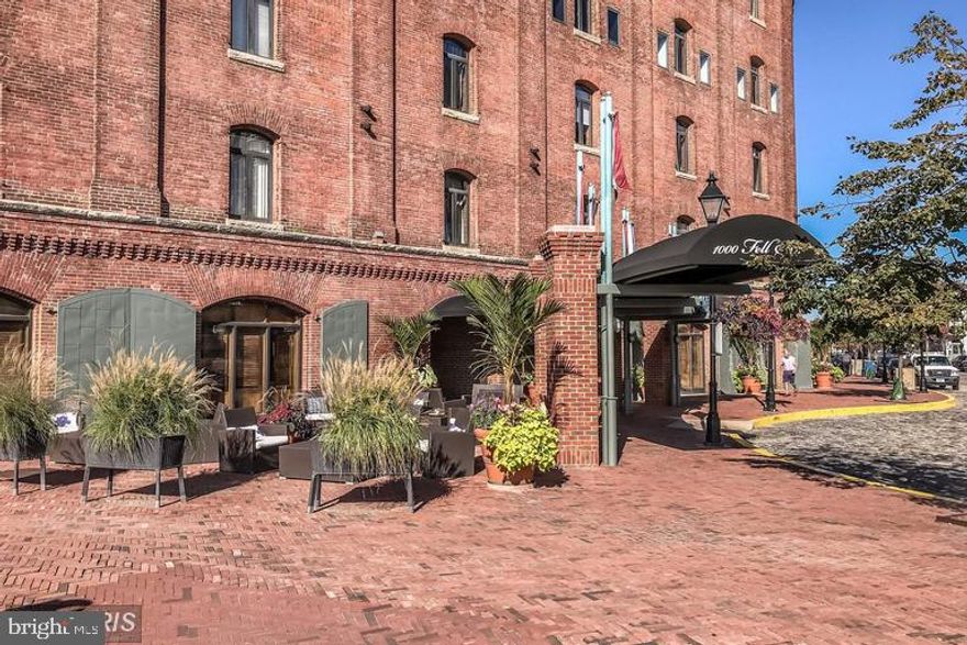 Waterfront two-level condo with garage parking. Complete rehab in 2006. Private 33' terrace with sweeping harbor and city views. Open floor plan with living room fireplace, hardwood floors, stainless steel appliances, granite counter tops with a breakfast bar. Half bath, separate laundry room, master bath w/ jetted tub & stand up shower. Pets are case by case.