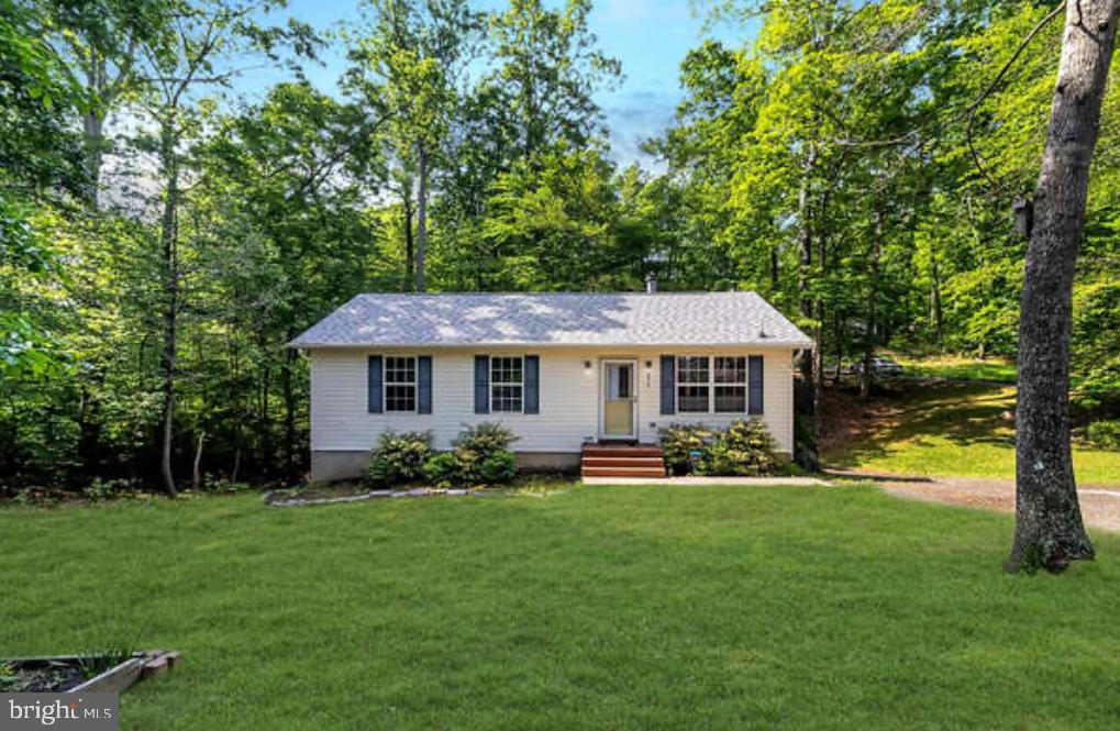 Nestled on a desirable corner lot, this charming home offers privacy and comfort in equal measure! From the moment you step inside, you’ll feel the care that’s been poured into every detail. The stunning flooring throughout the main level, great for pets or heavy traffic, making daily life a breeze. Soaring vaulted ceilings in the kitchen and family room—anchored by a cozy fireplace—create an inviting atmosphere that instantly feels like home. The spacious eat-in kitchen is a dream for any home cook, featuring ample cabinet and counter space to make meal prep effortless.
Step outside onto the sprawling deck, where you can grill up a feast or simply unwind after a long day of work. The generously sized bedrooms ensure plenty of space, and the Owner’s Suite boasts its own private bathroom for ultimate relaxation.
Head down to the lower level, a flexible and open area perfect for a media room, home office, or anything your heart desires. And let’s not forget the full-sized garage tucked at the back—ideal for parking, a workshop, a personal gym, or even additional finished living space. The possibilities are endless!
With 100% financing available, your dream home is closer than ever!