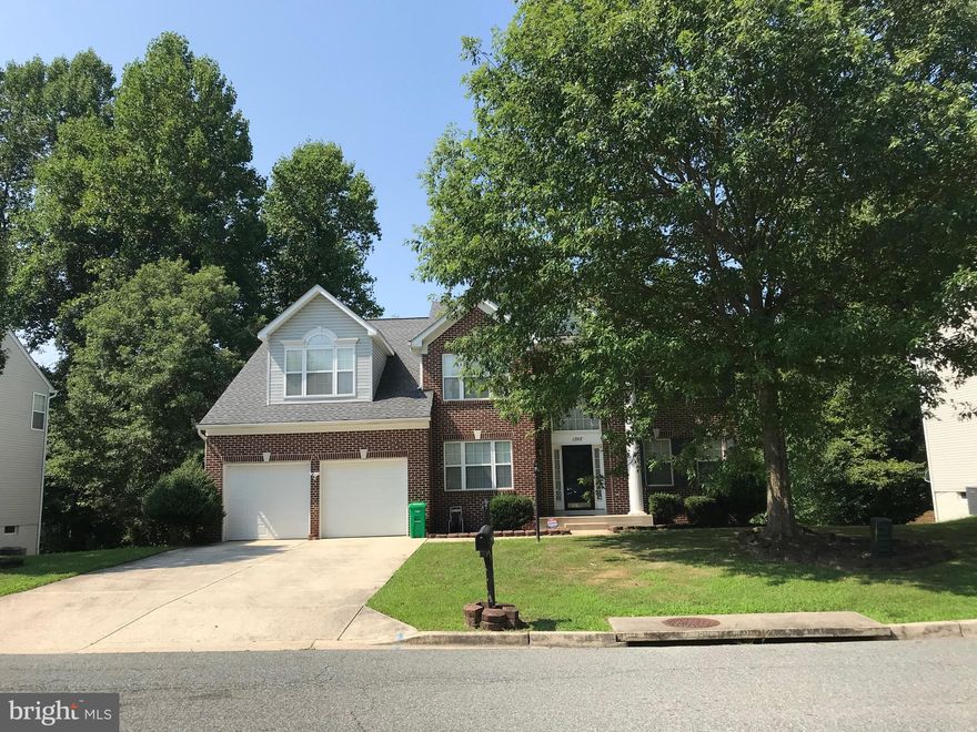 Colonial in sought after community.  Eat-in kitchen, sunroom with serene views. Huge natural light filled family room with a stone front fireplace.  Separate living room & dining room & Den. Hardwood floors in kitchen, sunroom, powder room & foyer, waterfall staircase. Upstairs, 4 bedrooms. Step up Owner’s suite, sitting room & step-down master bath, walk-n his & hers. Fully finished basement with theatre room, weight room or 5th bedroom. Two car garage. Near Wegmans, Costco, Kaiser, and so much more.