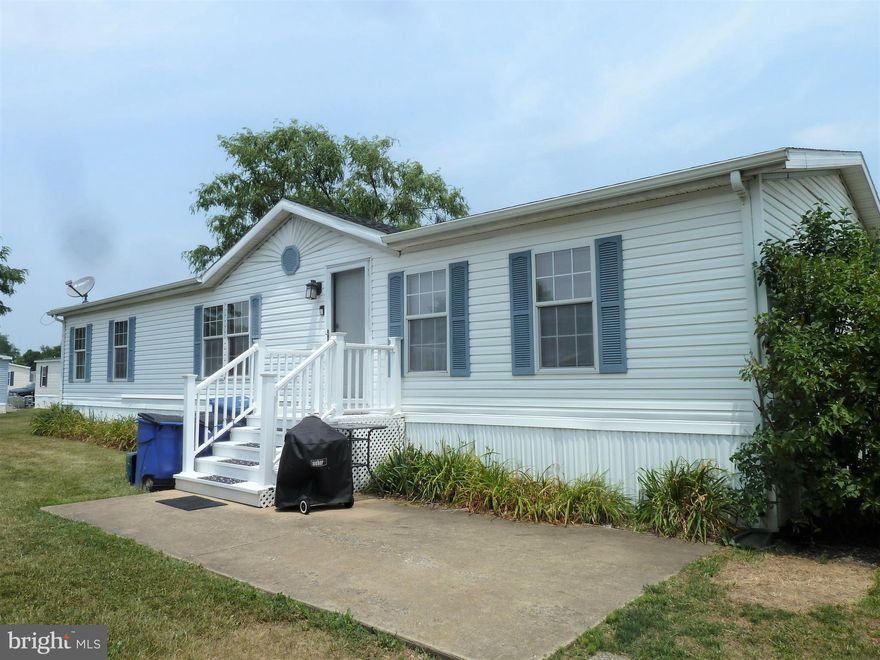 Spacious mobile home home with over 1,500 sq. ft. Offers an open, flowing layout of the living room, kitchen and dining area and separation of the primary suite on one end and the other two bedrooms on the other. The kitchen boasts a surprising amount of cabinetry and  counter space. All bedrooms are nice-sized and have walk-in closets! The primary bath provides a soaking tub and extra wide shower stall with seat and both bathrooms have a skylight for ample brightness. Roof and AC were replaced approximately two years ago and ducts professionally cleaned just recently. Ground rent is $565/month (includes trash/recycling) and buyers must be approved by Lakeside management. Application fee is $35 per adult.